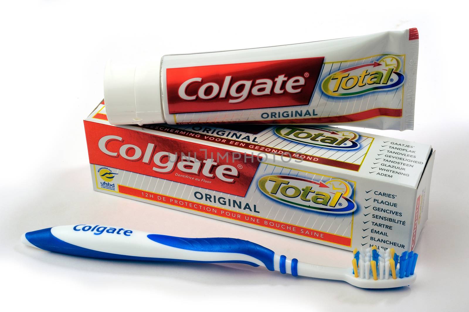 Set of Colgate toothpaste with toothbrush by gillespaire