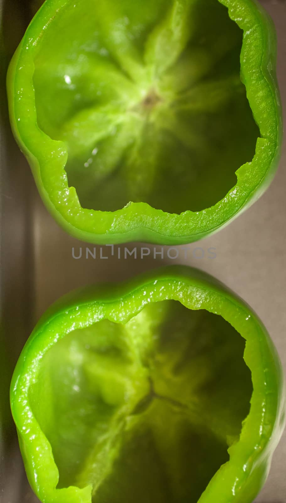 Green bell peppers cut and cleaned for stuffed peppers.