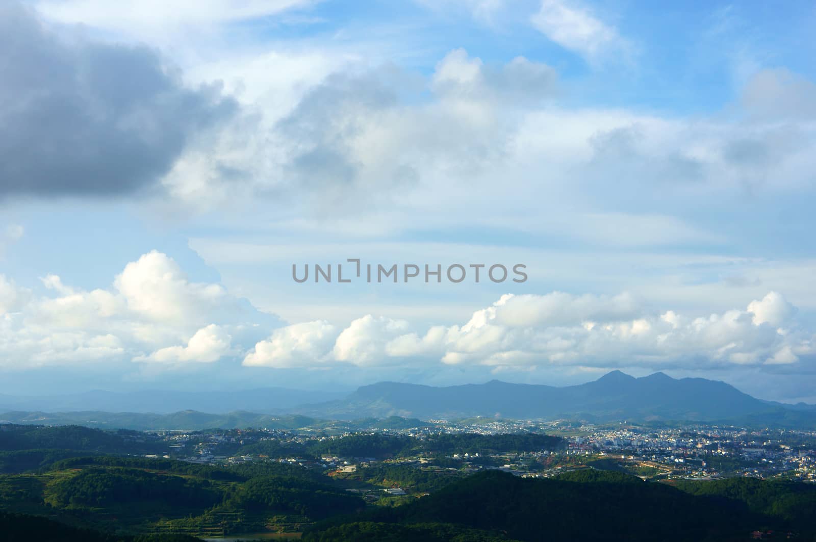 Wonderful Vietnam country landscape, view chain of mountain, beautiful cloudy sky, residence at green valley, fresh air, impression cloudscape, nice countryside for Dalat travel