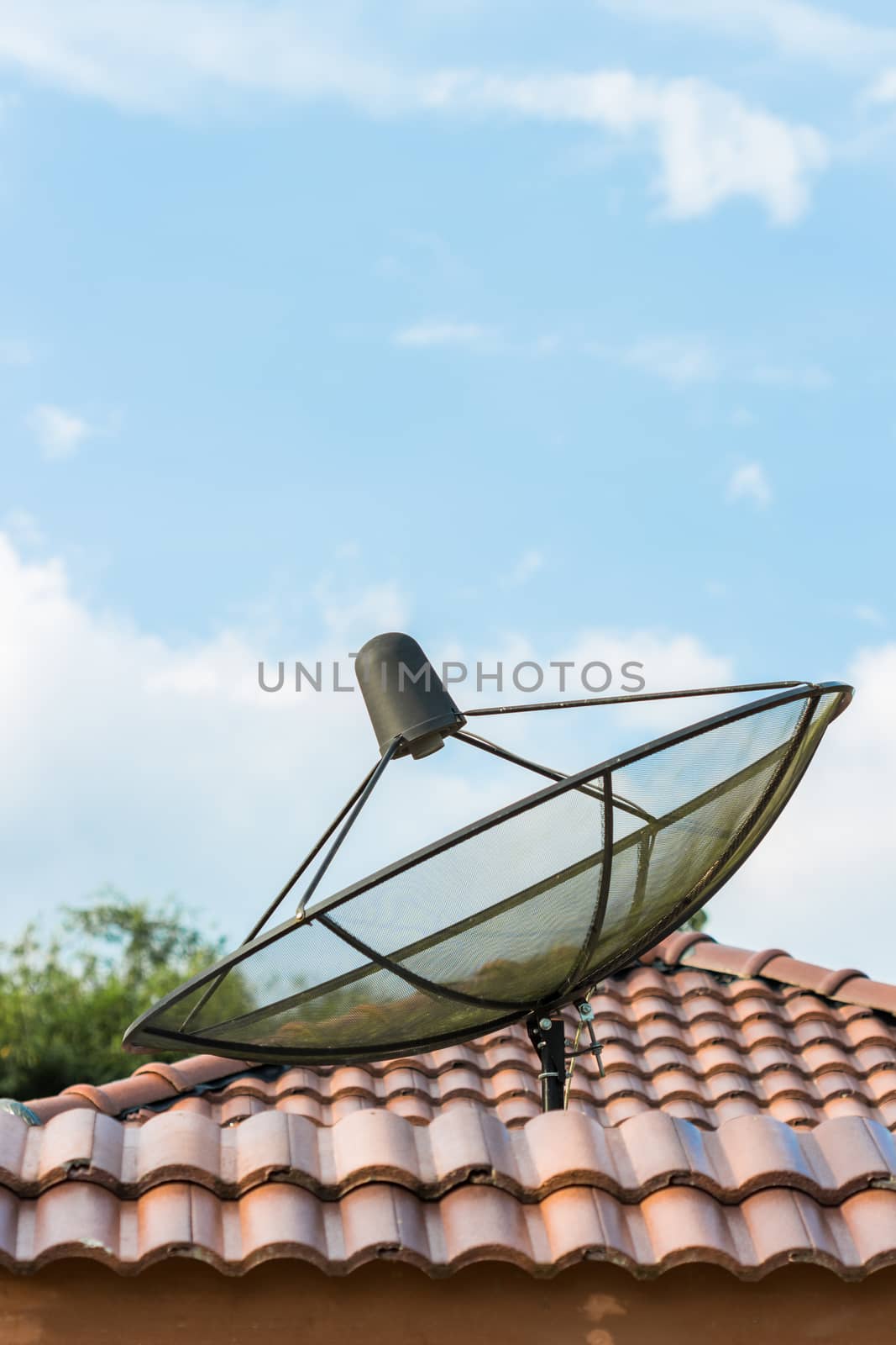 satellite of telecommunication on roof by blackzheep