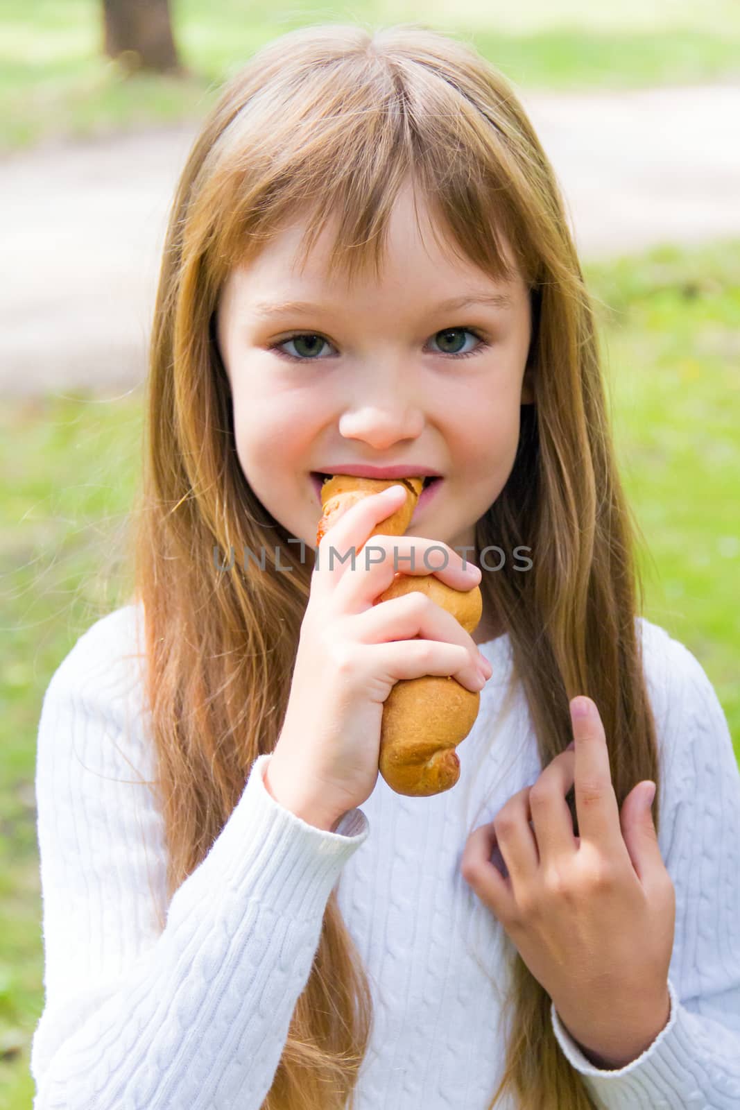 Photo of eating cute girl with long hair