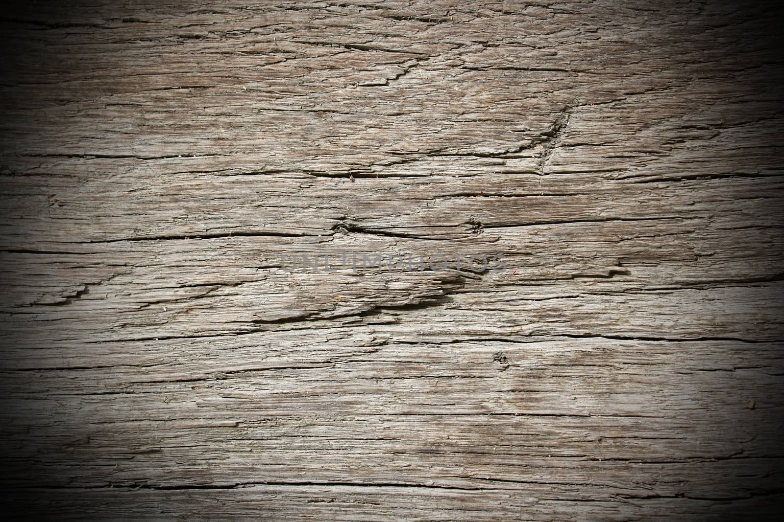 detail on ancient oak wooden beam with vignette