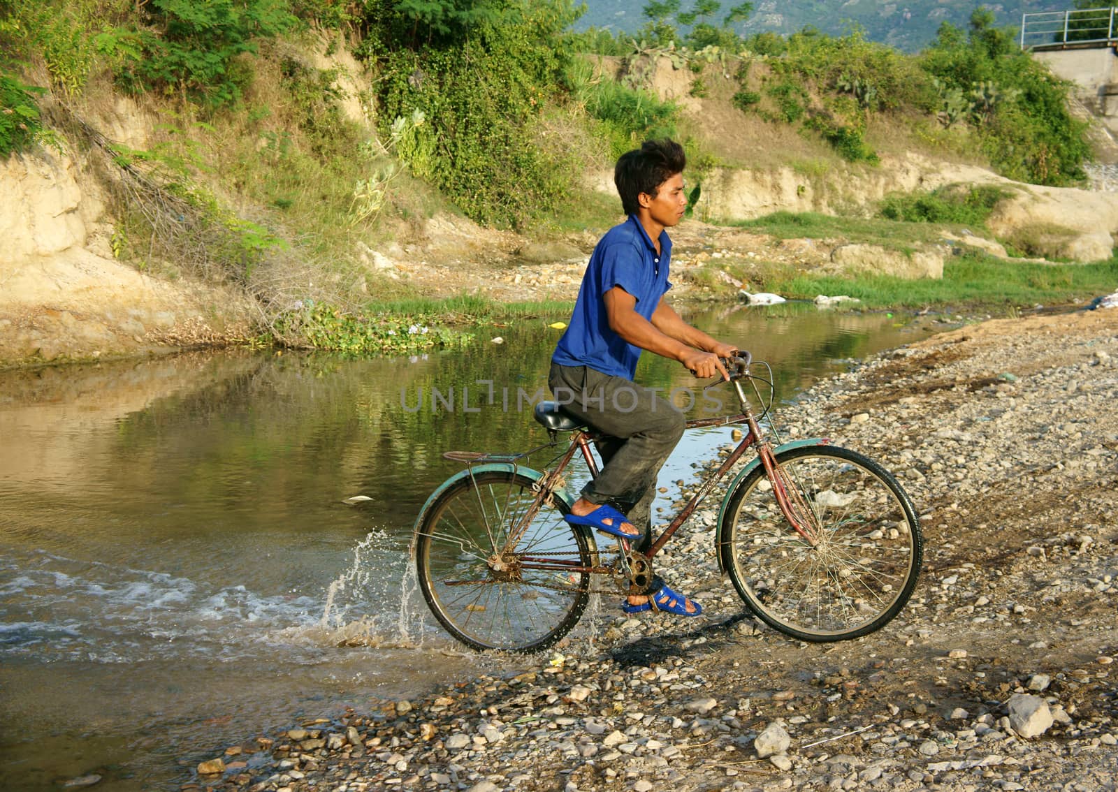 bike cross stream, Vietnamese countryside by xuanhuongho