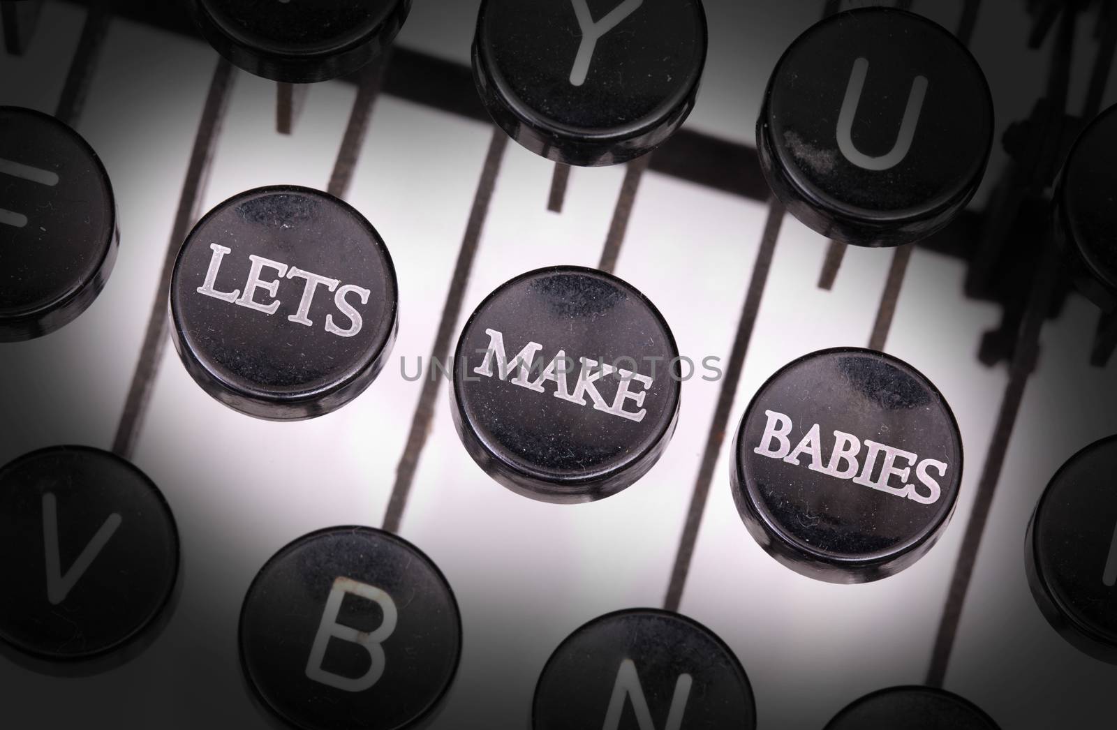 Typewriter with special buttons, lets make babies