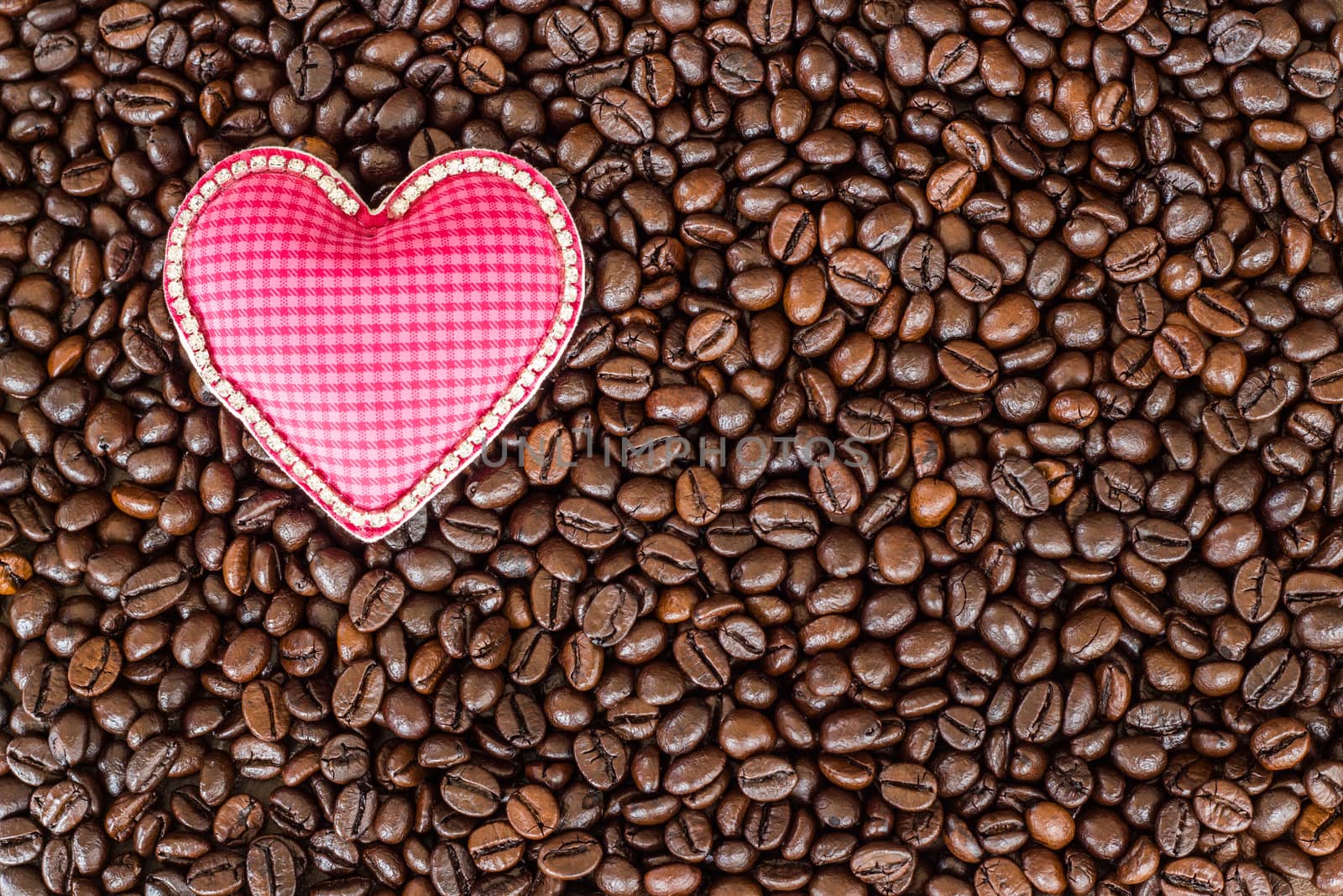 heart love symbol on coffee beans