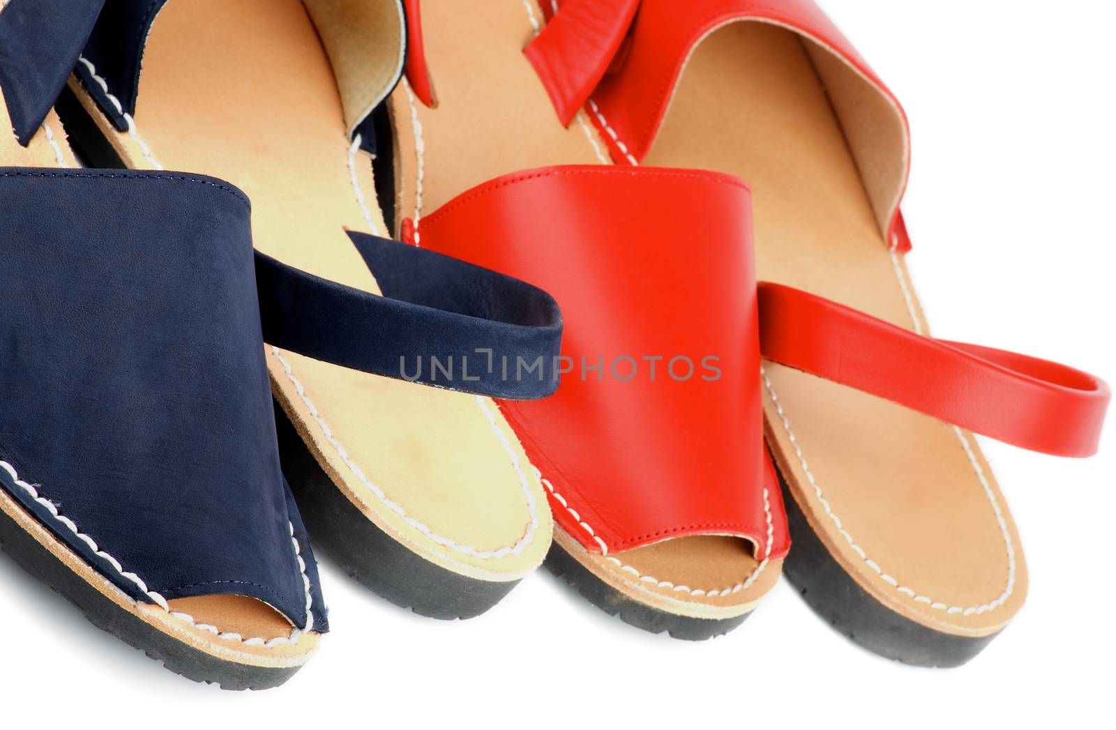 Border of Red and Blue Leather Summer Sandals isolated on white background