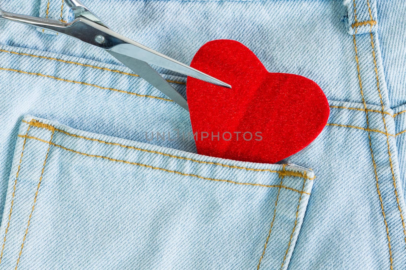 scissors cut heart love on jeans background by blackzheep