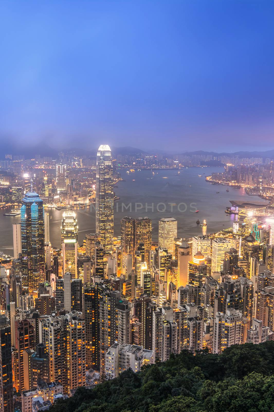 Hong Kong city night with building skyline and skyscraper in Hong Kong.