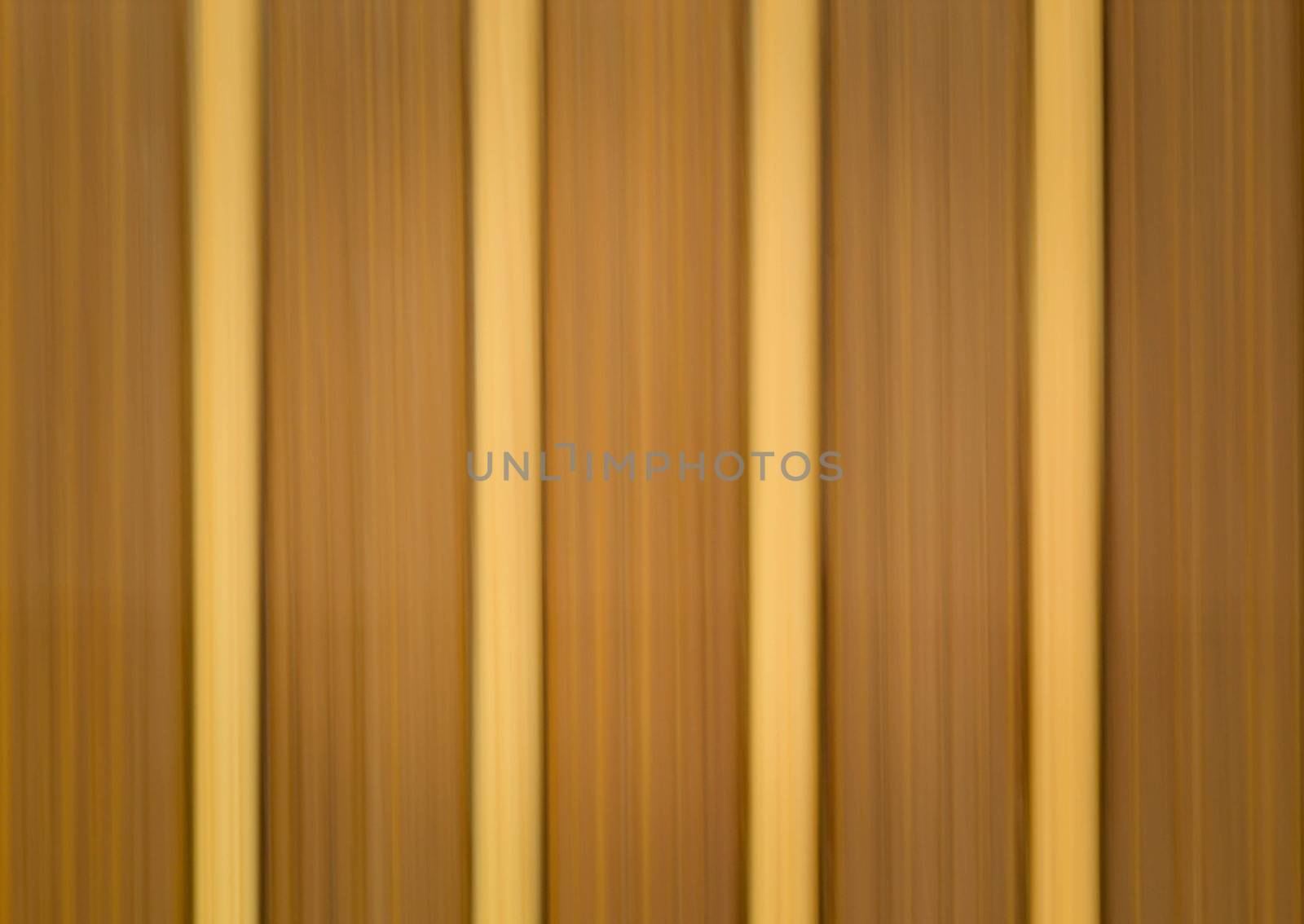 abstract background or texture blurred wooden slats brown color