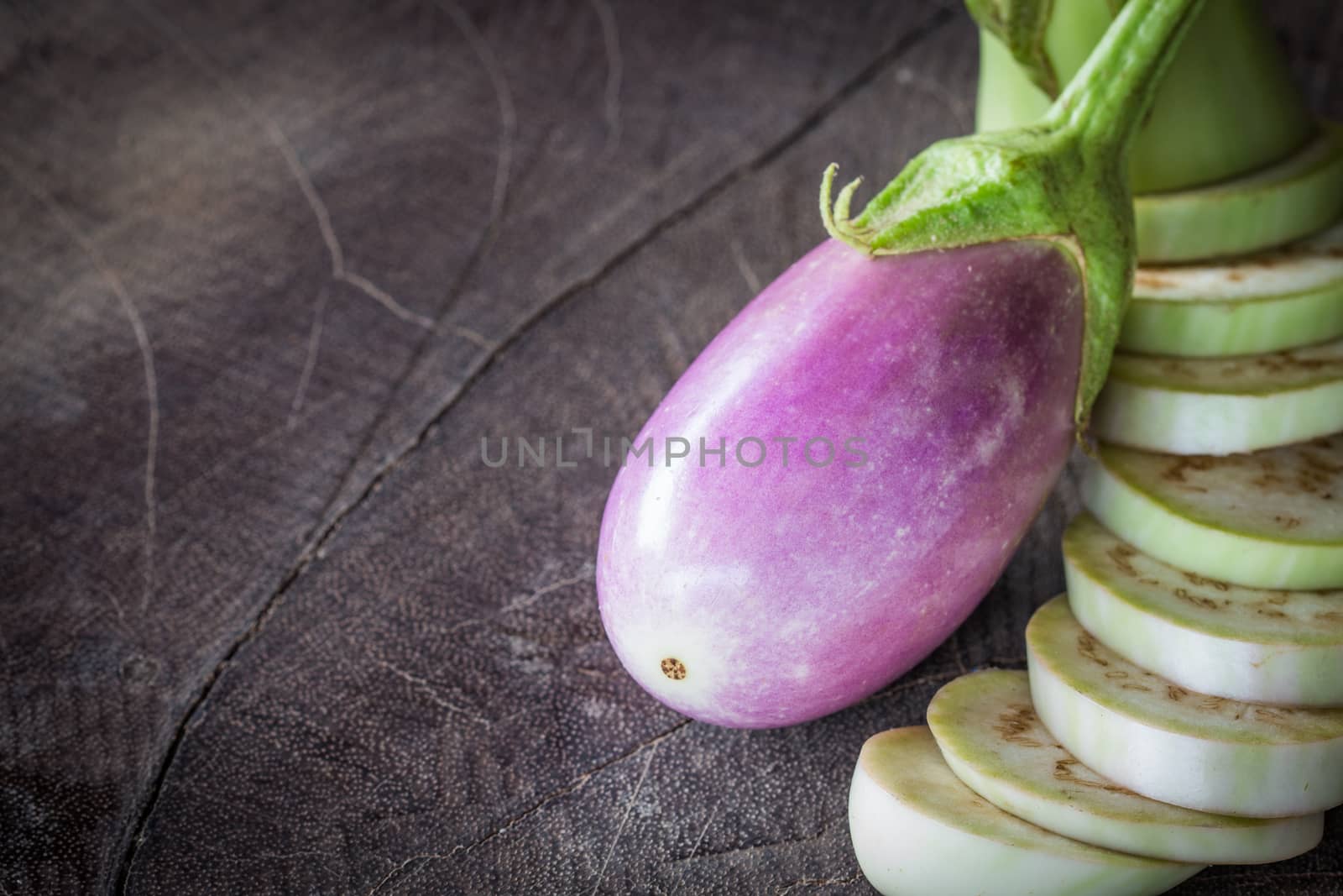 aubergine organic food on wood