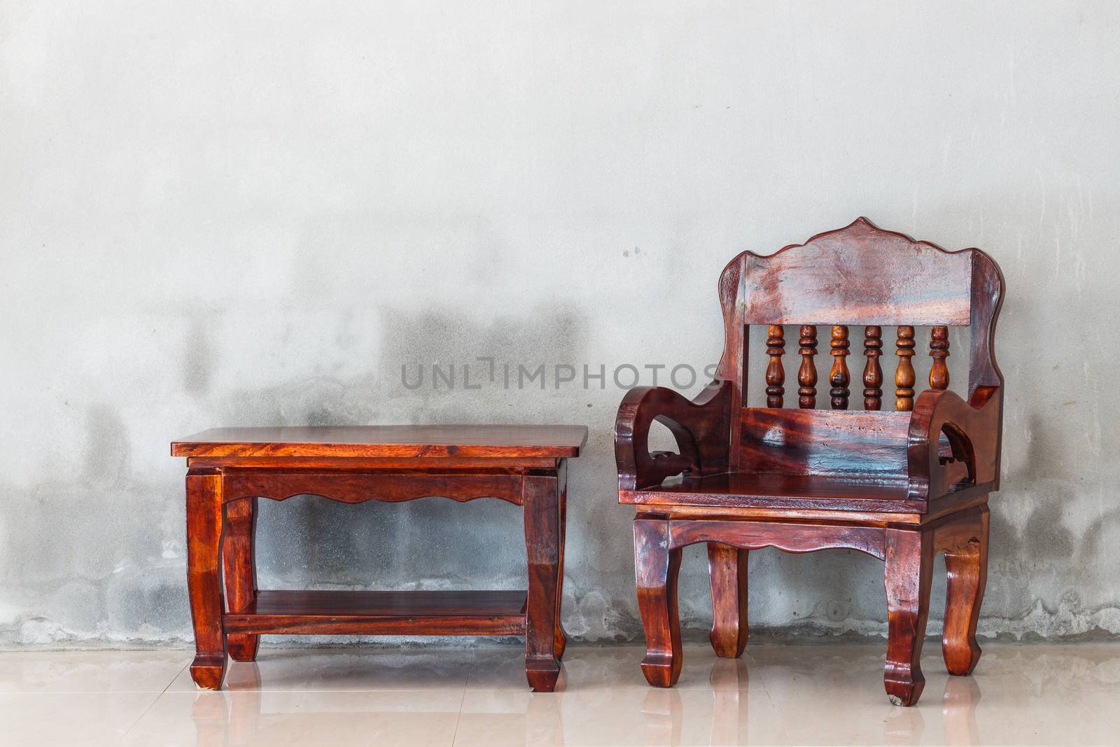 wood chair and table furniture and grunge concrete background by blackzheep