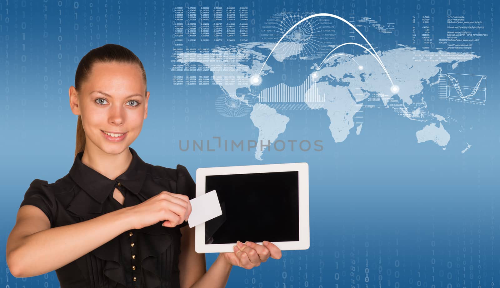 Beautiful businesswoman in dress holding tablet and white empty card near screen of tablet. World map, graphs and figures as backdrop