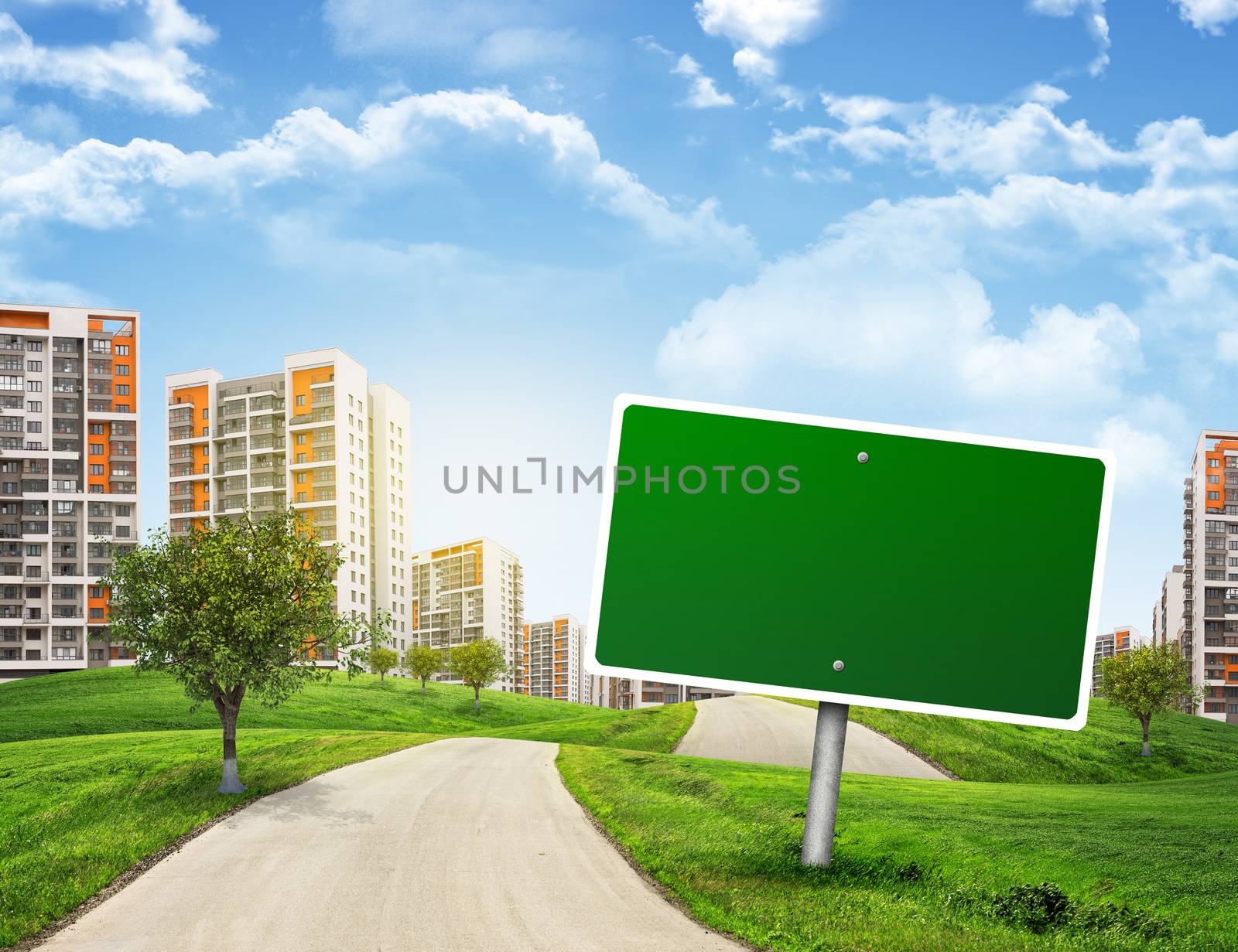 Buildings, green hills and road with empty road sign against sky with clouds. Business concept