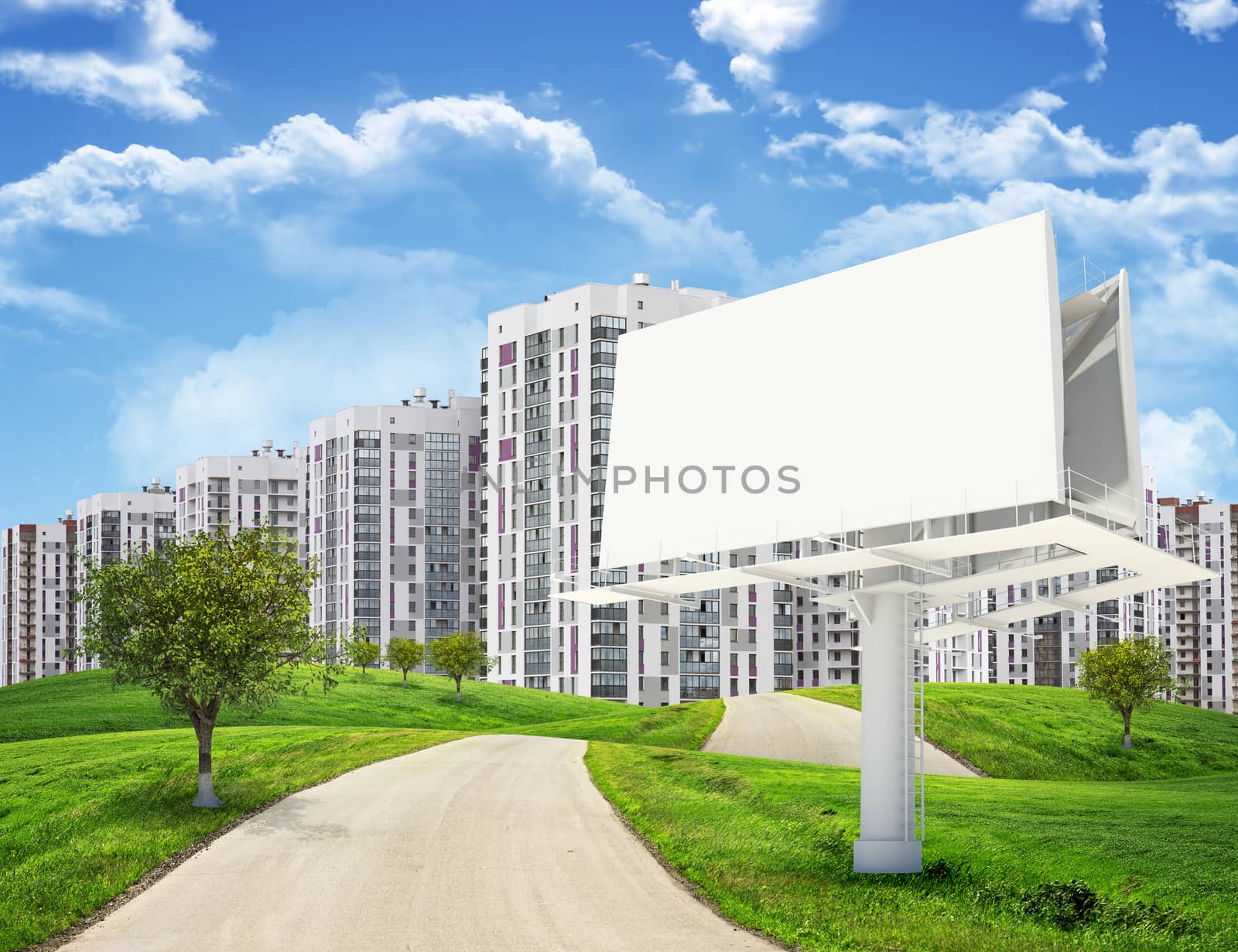 Tall buildings, green hills and road with large billboard against sky by cherezoff