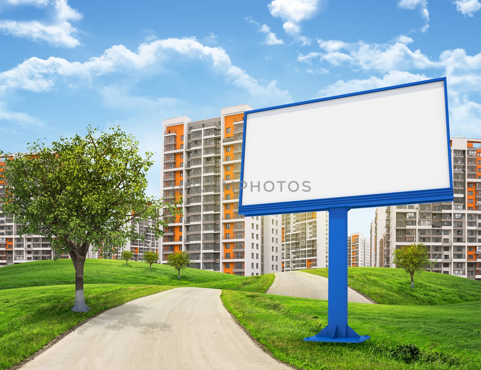 Tall buildings, green hills and road with large billboard against sky by cherezoff