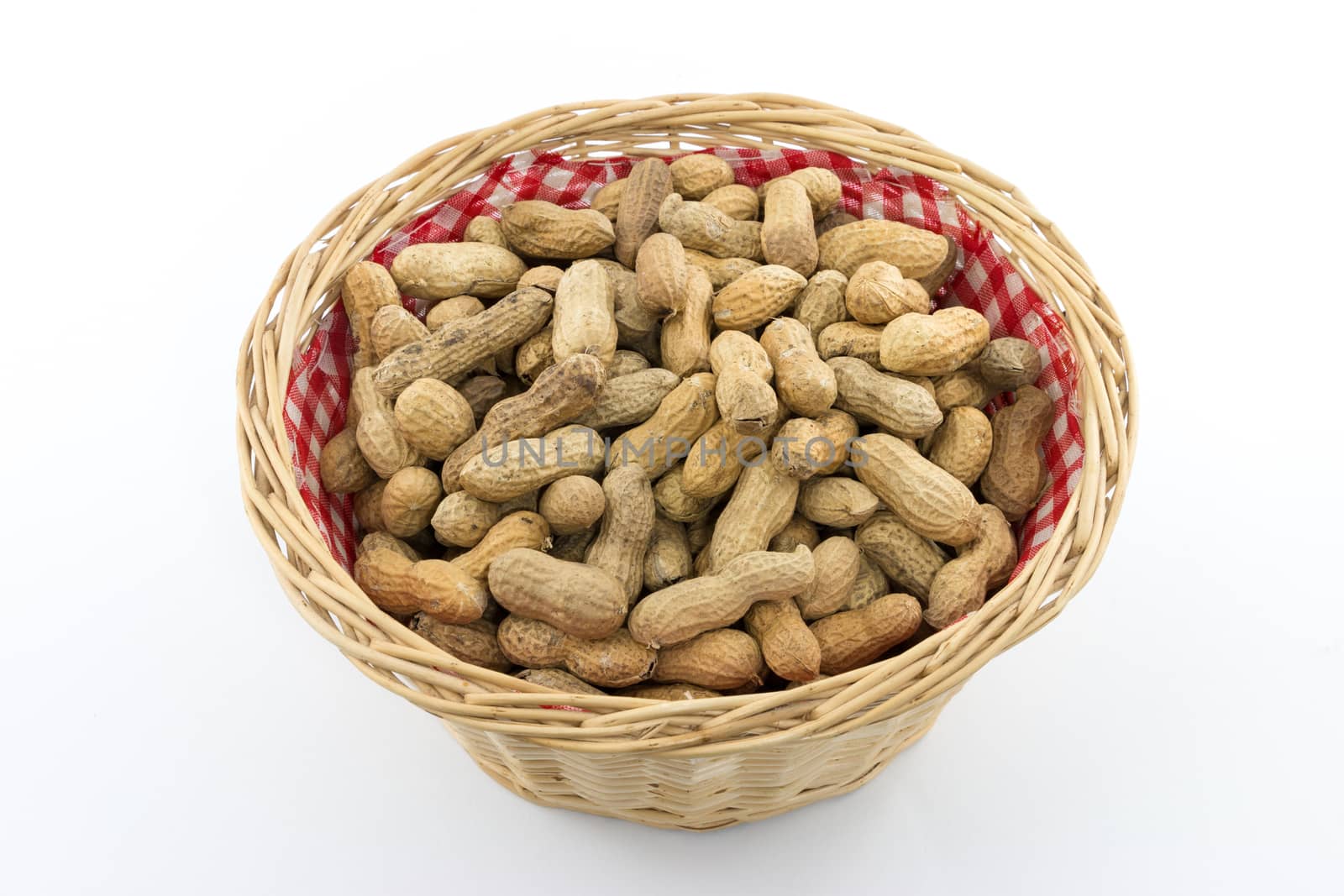 Small bast basket filled with many peanuts