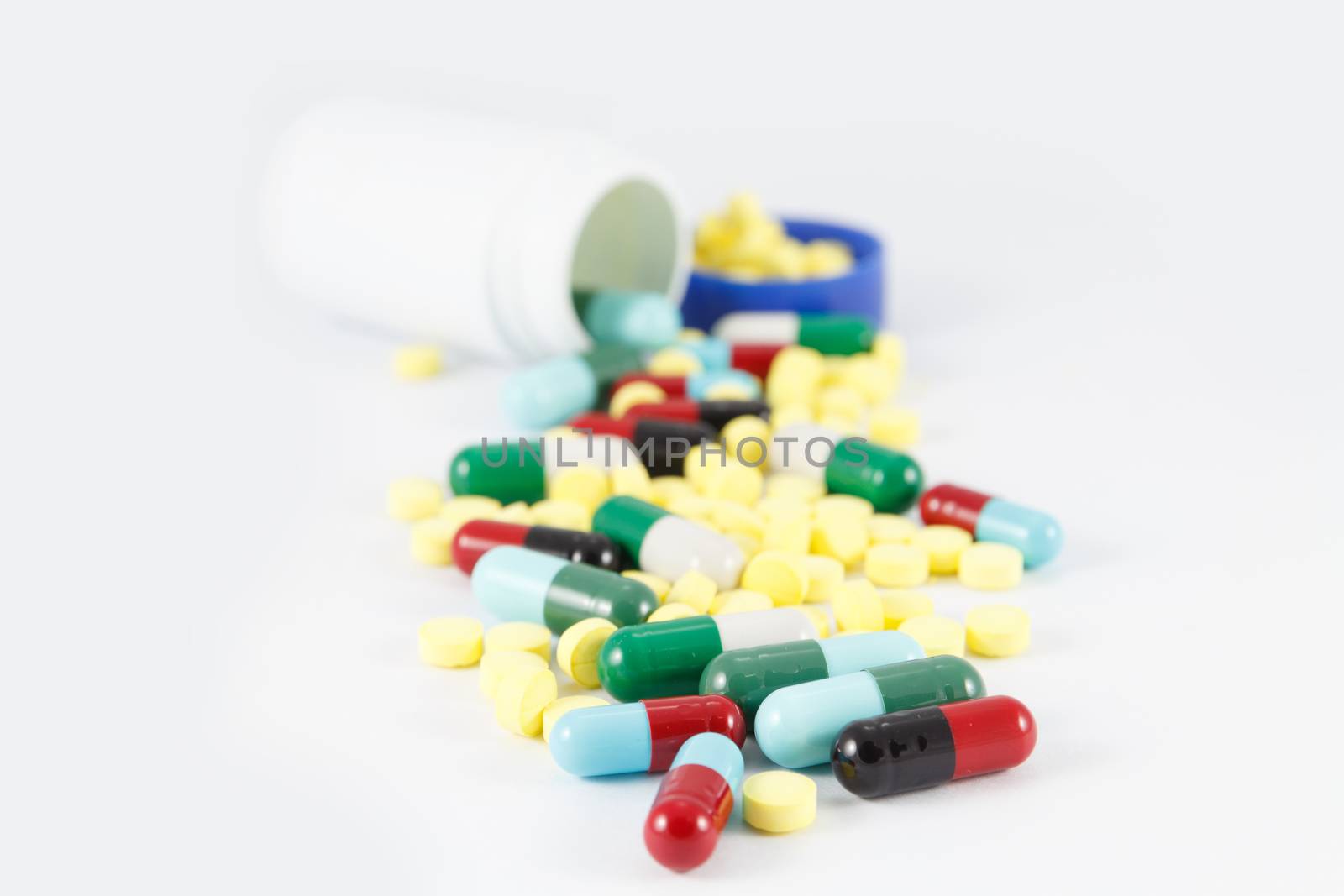 Close up pills medical capsule by blackzheep