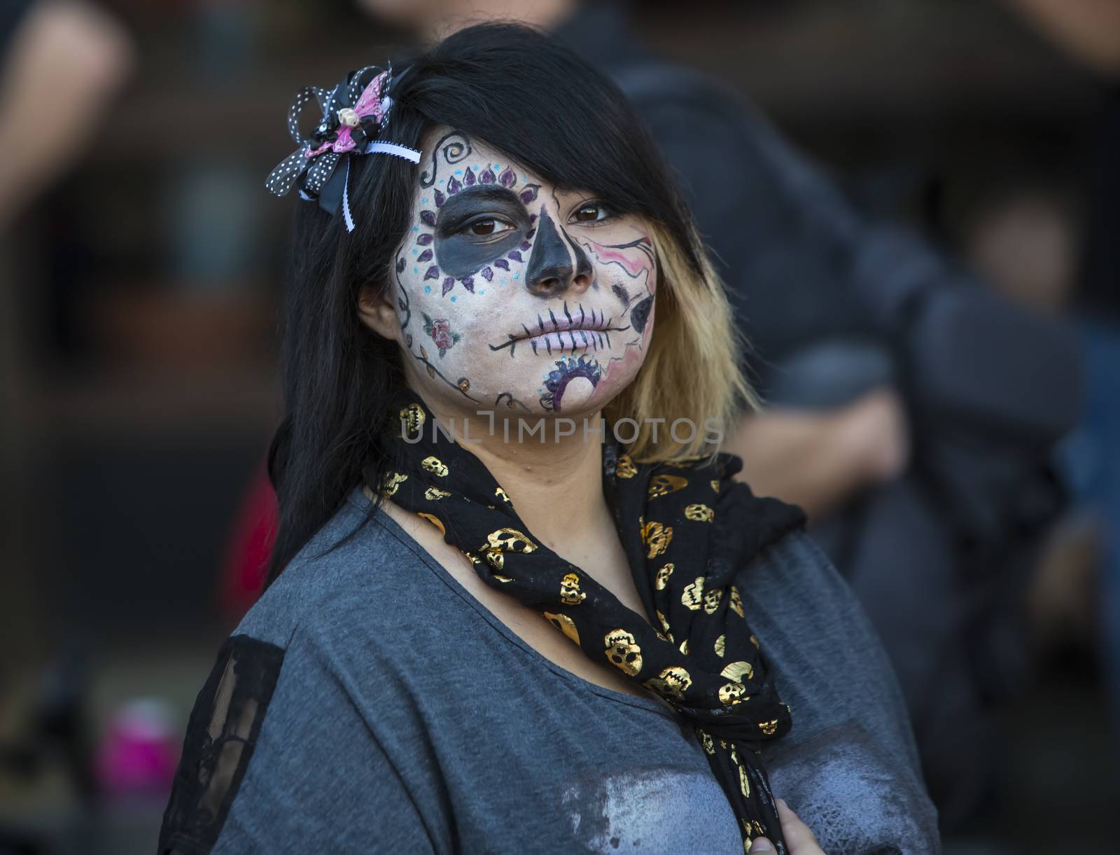 TUCSON, AZ/USA - NOVEMBER 09: Unidentified young woman in facepaint at the All Souls Procession on November 09, 2014 in Tucson, AZ, USA.