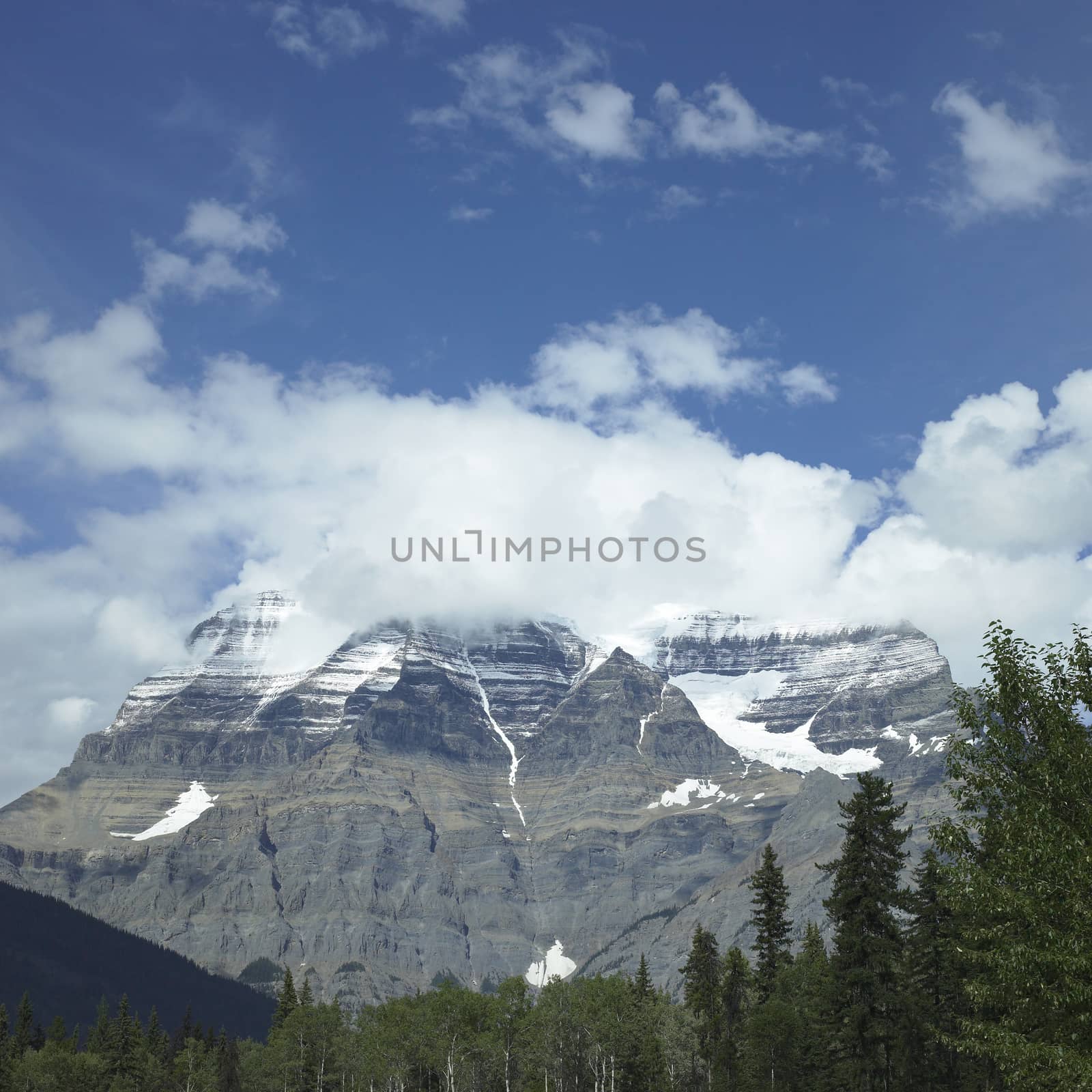 Rocky mountain top with white snow