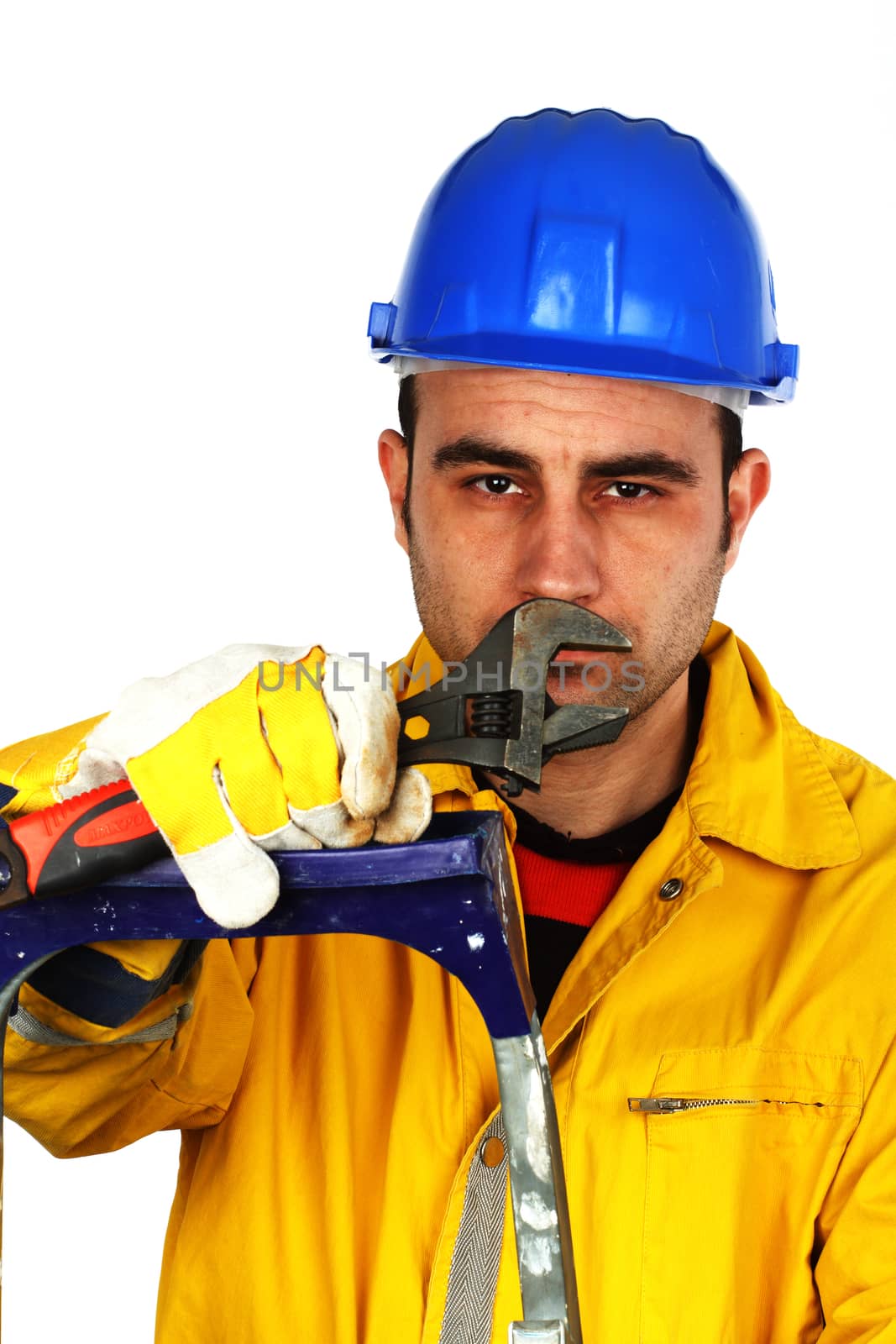 Portrait of young worker with a wrench