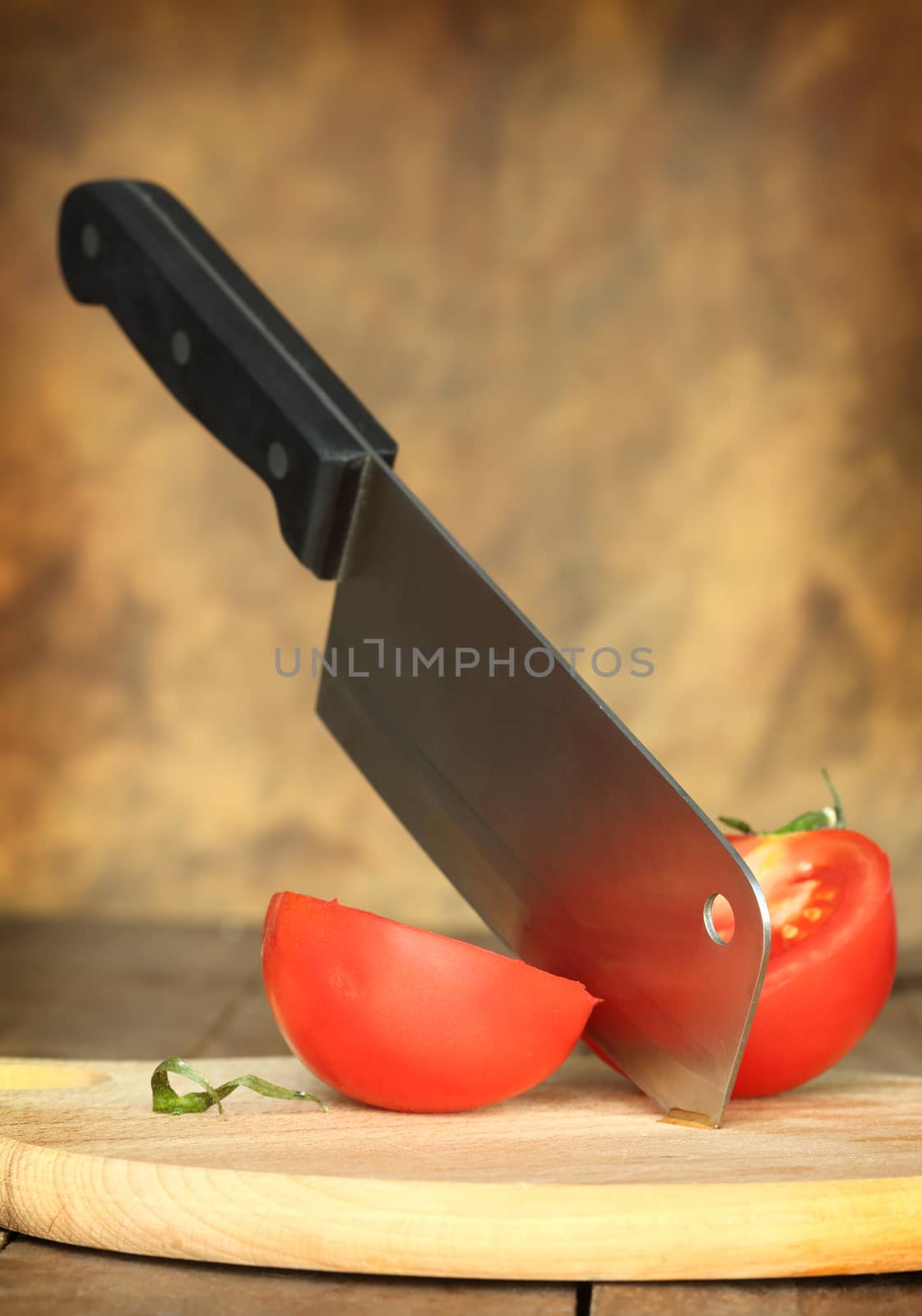 cleaver and tomato by alexkosev