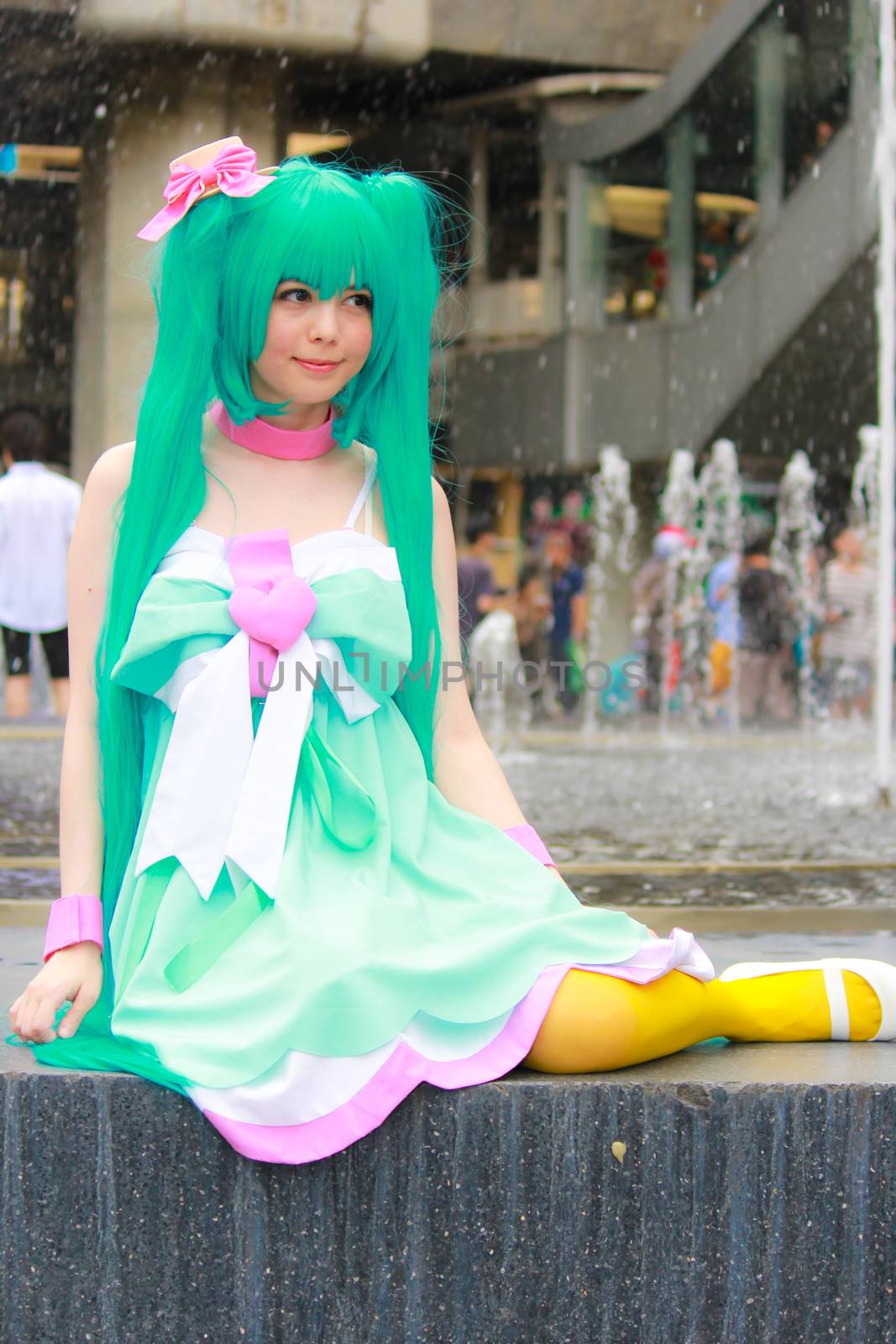 Bangkok - Aug 31: An unidentified Japanese anime cosplay pose  on August 31, 2014 at Central World, Bangkok, Thailand.