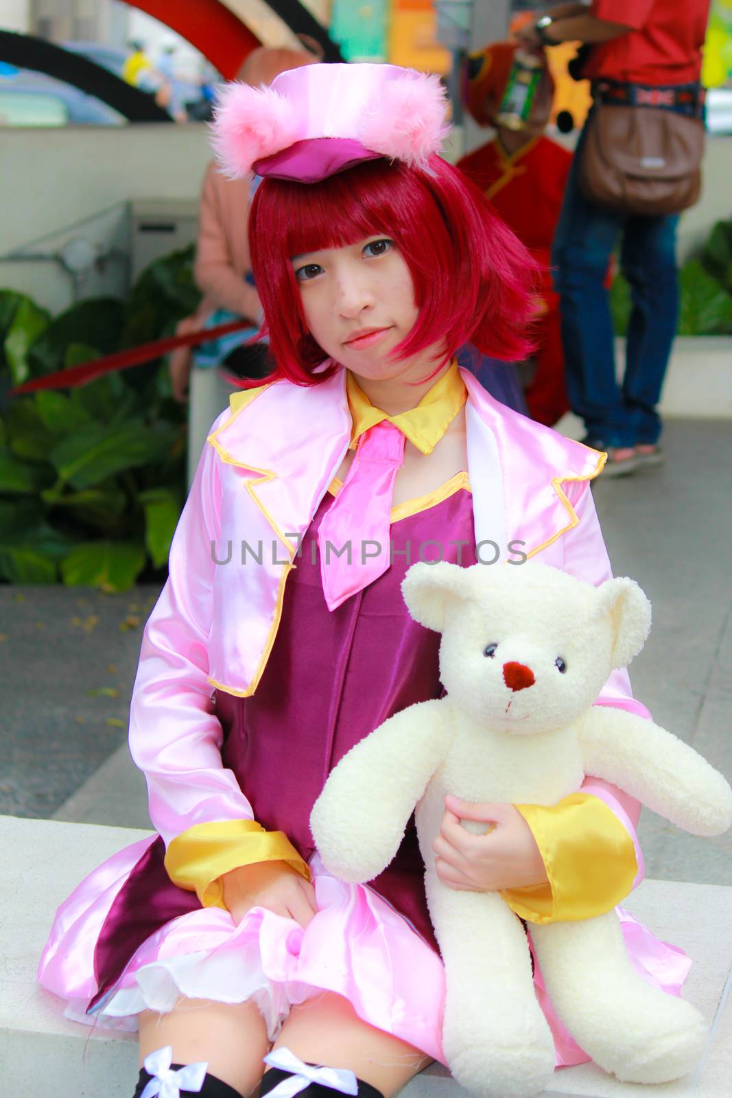 Bangkok - Aug 31: An unidentified Japanese anime cosplay pose  on August 31, 2014 at Central World, Bangkok, Thailand.