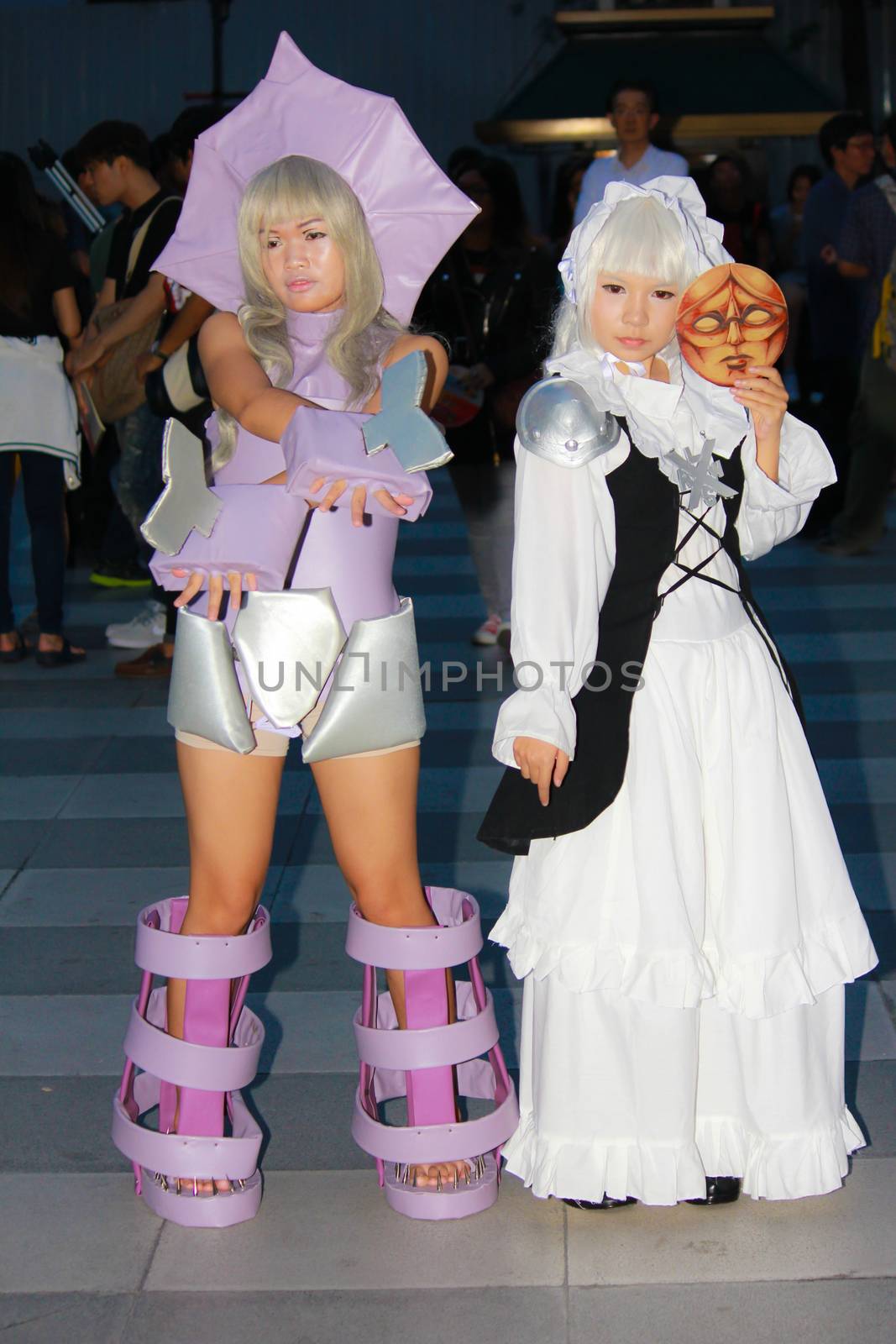 Bangkok - Aug 31: An unidentified Japanese anime cosplay pose  on August 31, 2014 at Central World, Bangkok, Thailand.