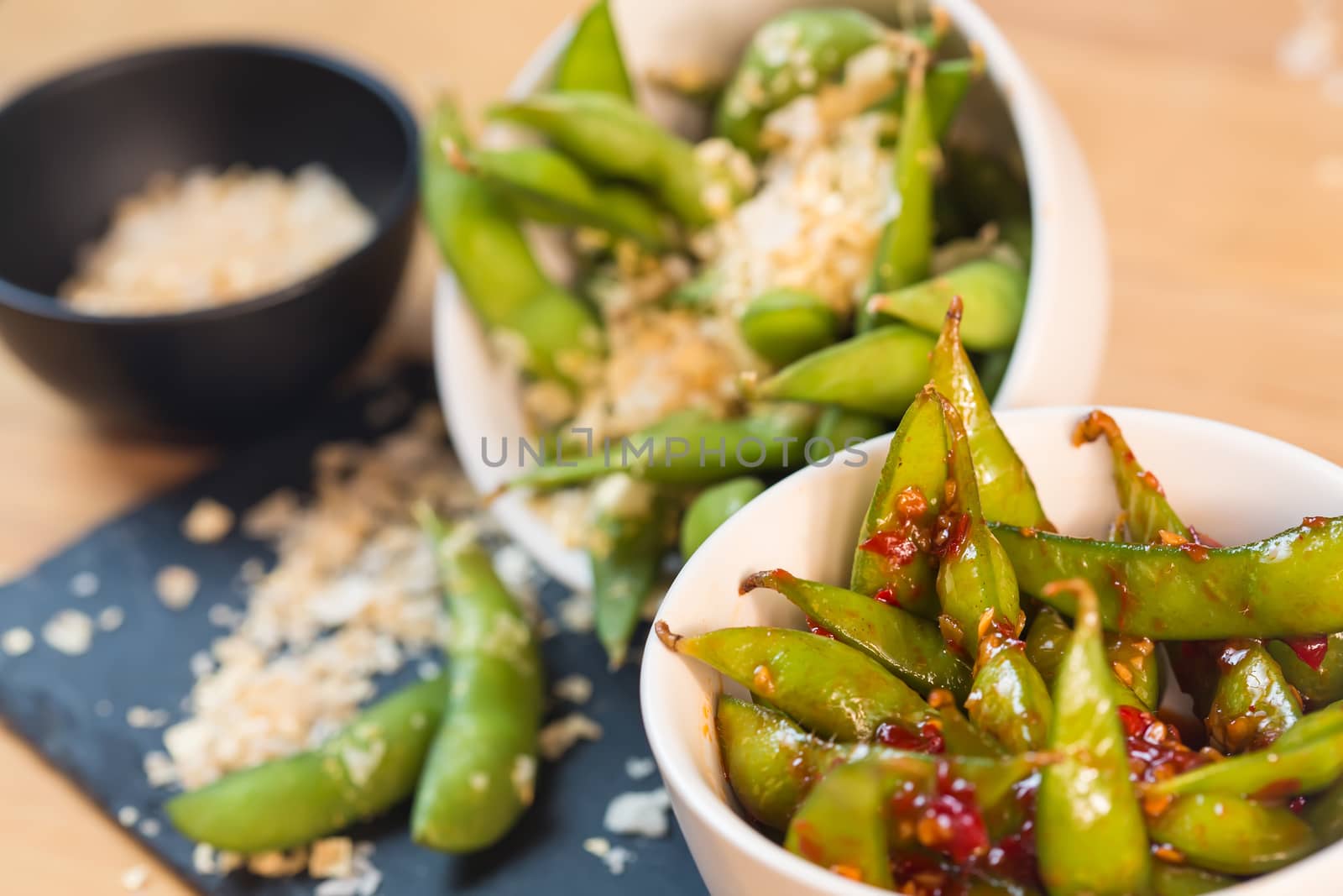 Green string beans chinese dish with spices. Selective focus