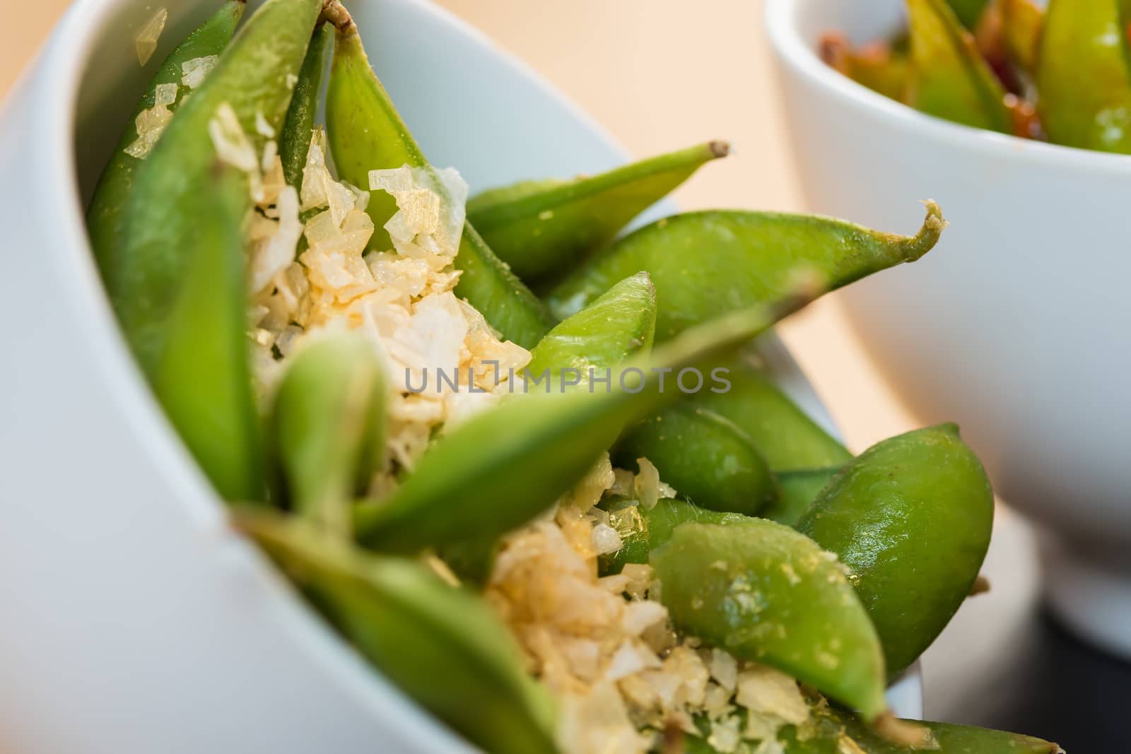 Green string beans chinese dish with spices. Selective focus