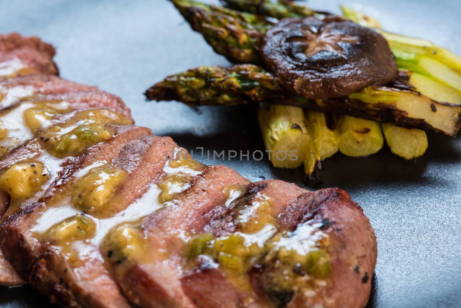 Duck breast on orange sauce with vegetable. Japanese cuisine. selective focus