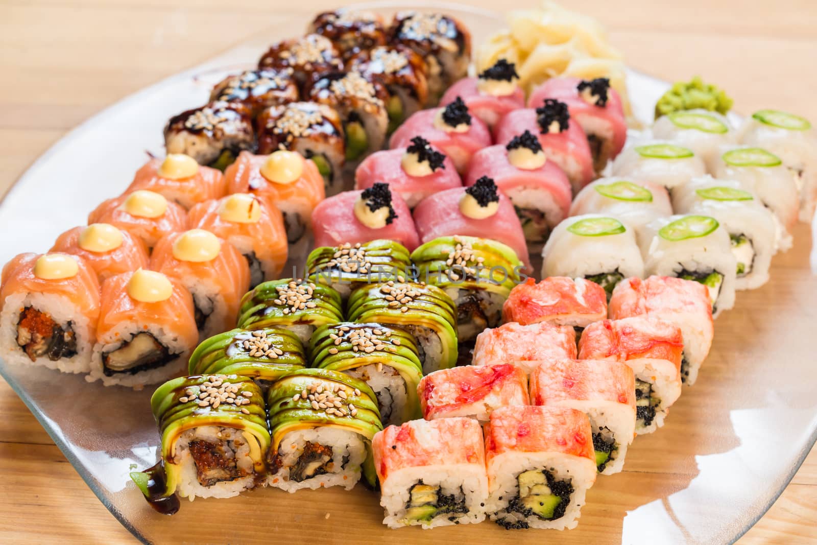 set of Japanese sushi on a white plate