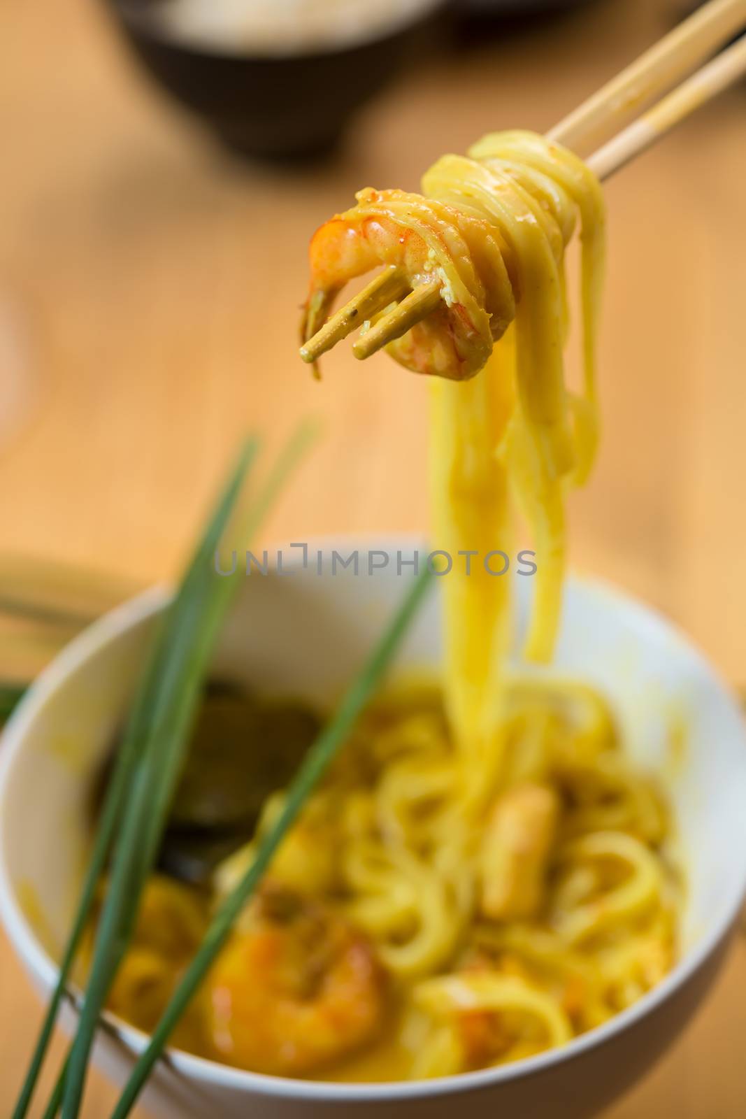 chinese stir fried noodles on white plate. selective focus