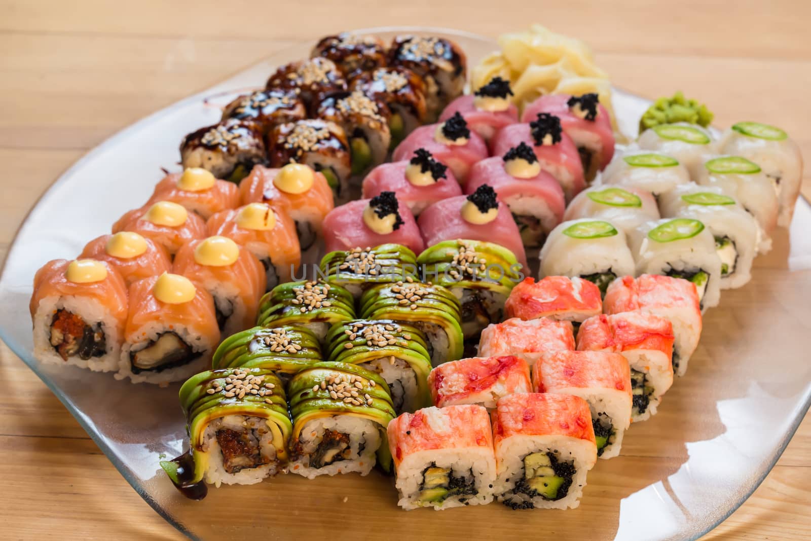 set of Japanese sushi on a white plate