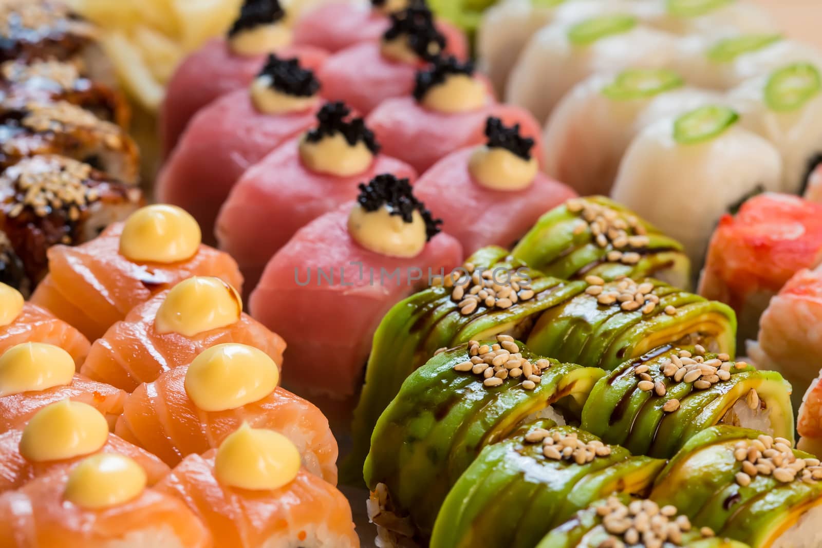 set of Japanese sushi on a white plate