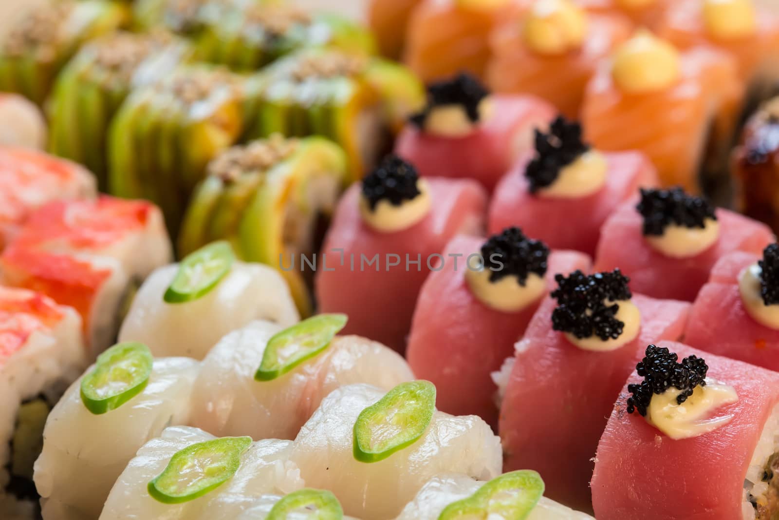 set of Japanese sushi on a white plate