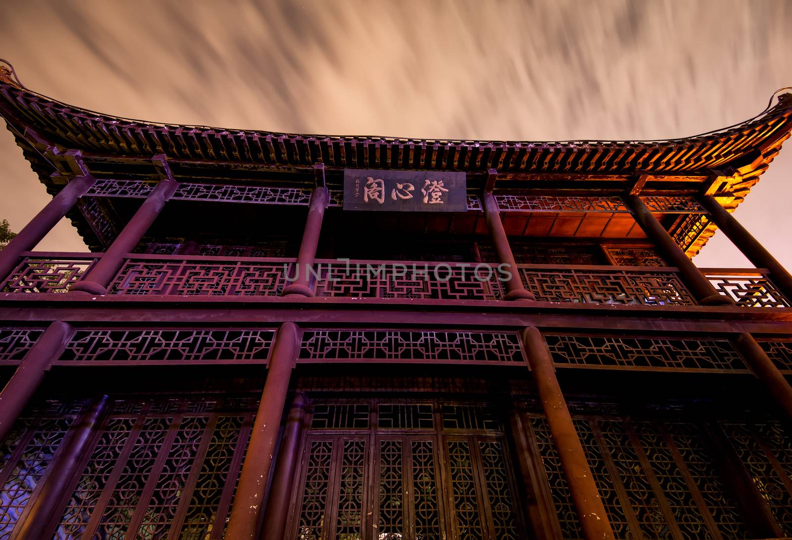 Chinese building at night that is old