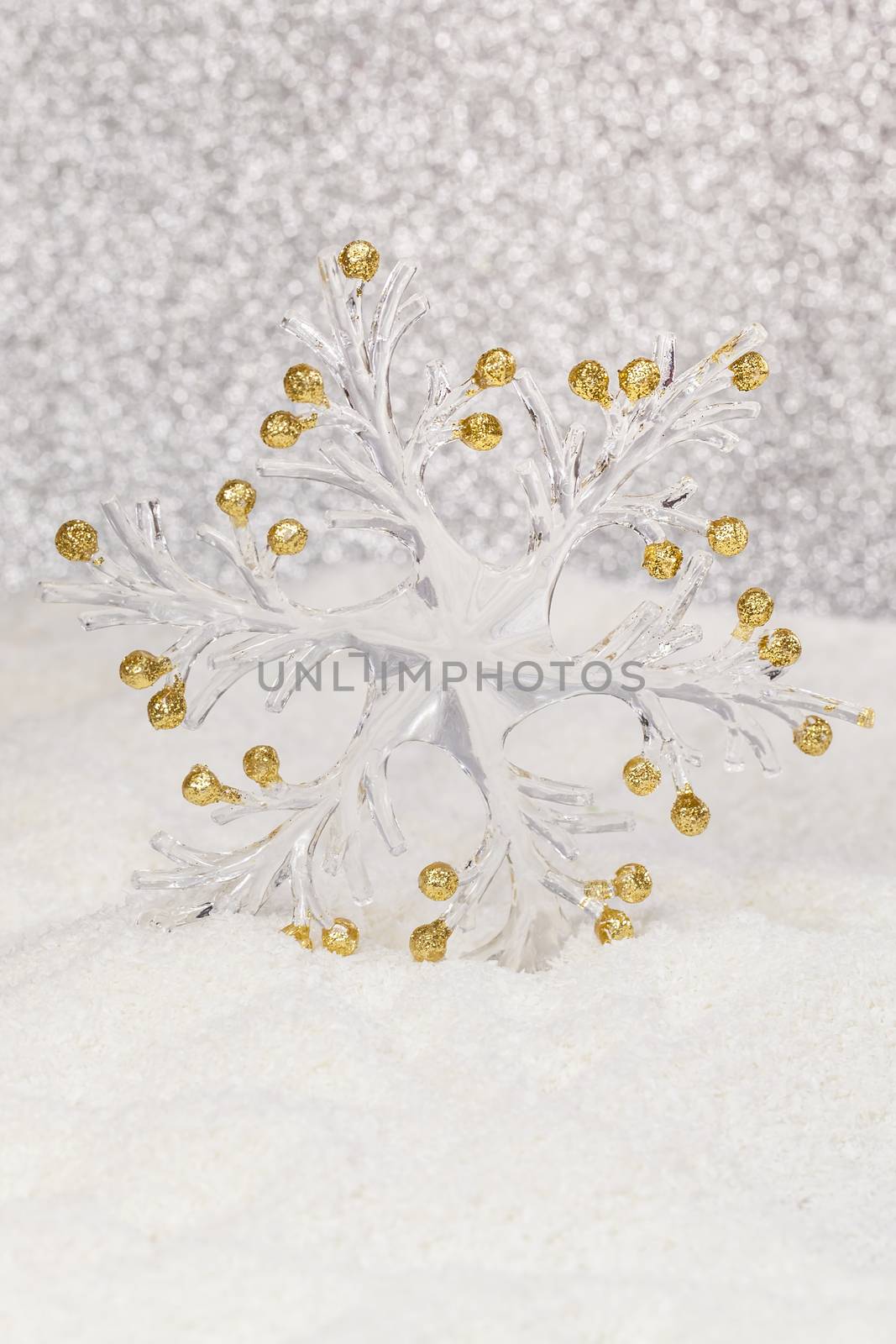 Beautiful snowflake on snow. Winter holidays concept. Shallow depth of field