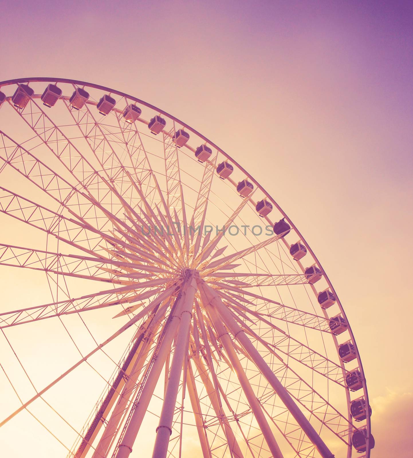 Ferris wheel with blue sky with retro effect by nuchylee