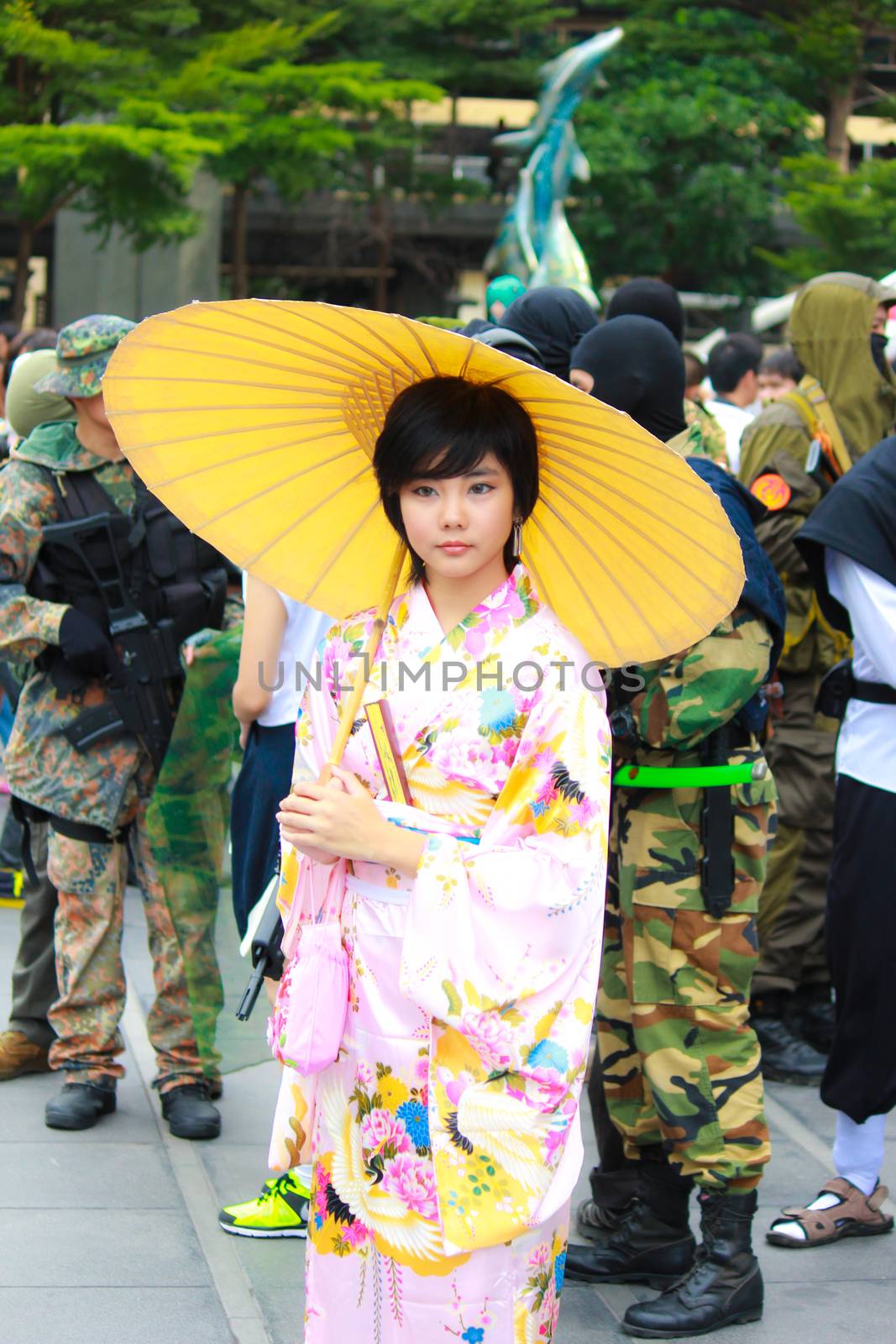 Bangkok - Aug 31: An unidentified Japanese anime cosplay pose  on August 31, 2014 at Central World, Bangkok, Thailand.