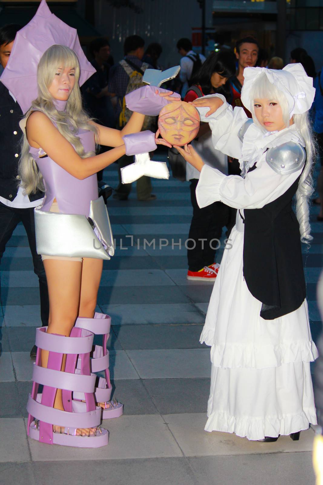 Bangkok - Aug 31: An unidentified Japanese anime cosplay pose  on August 31, 2014 at Central World, Bangkok, Thailand.