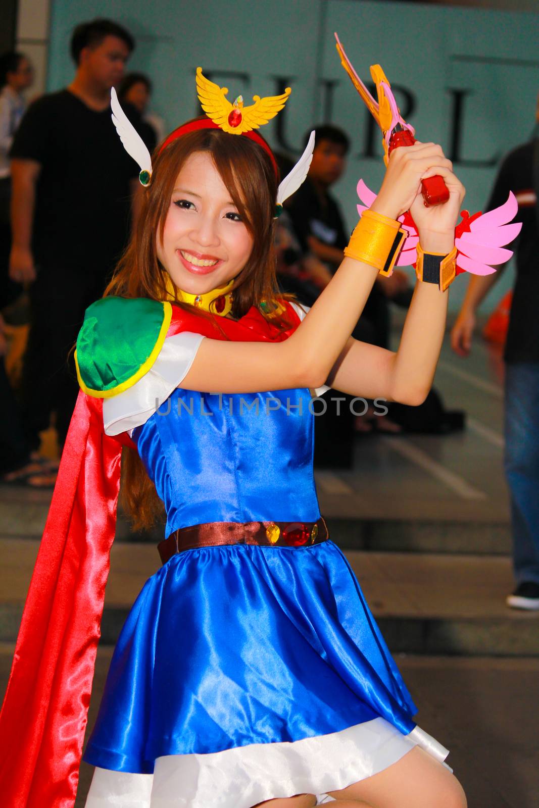 Bangkok - Aug 31: An unidentified Japanese anime cosplay pose  on August 31, 2014 at Central World, Bangkok, Thailand.