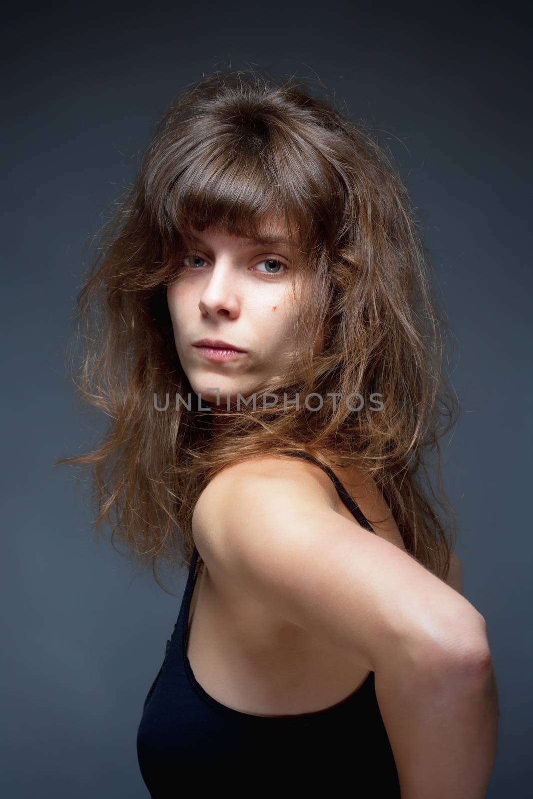 Portrait of a Young Sensual Woman with Brown Hair