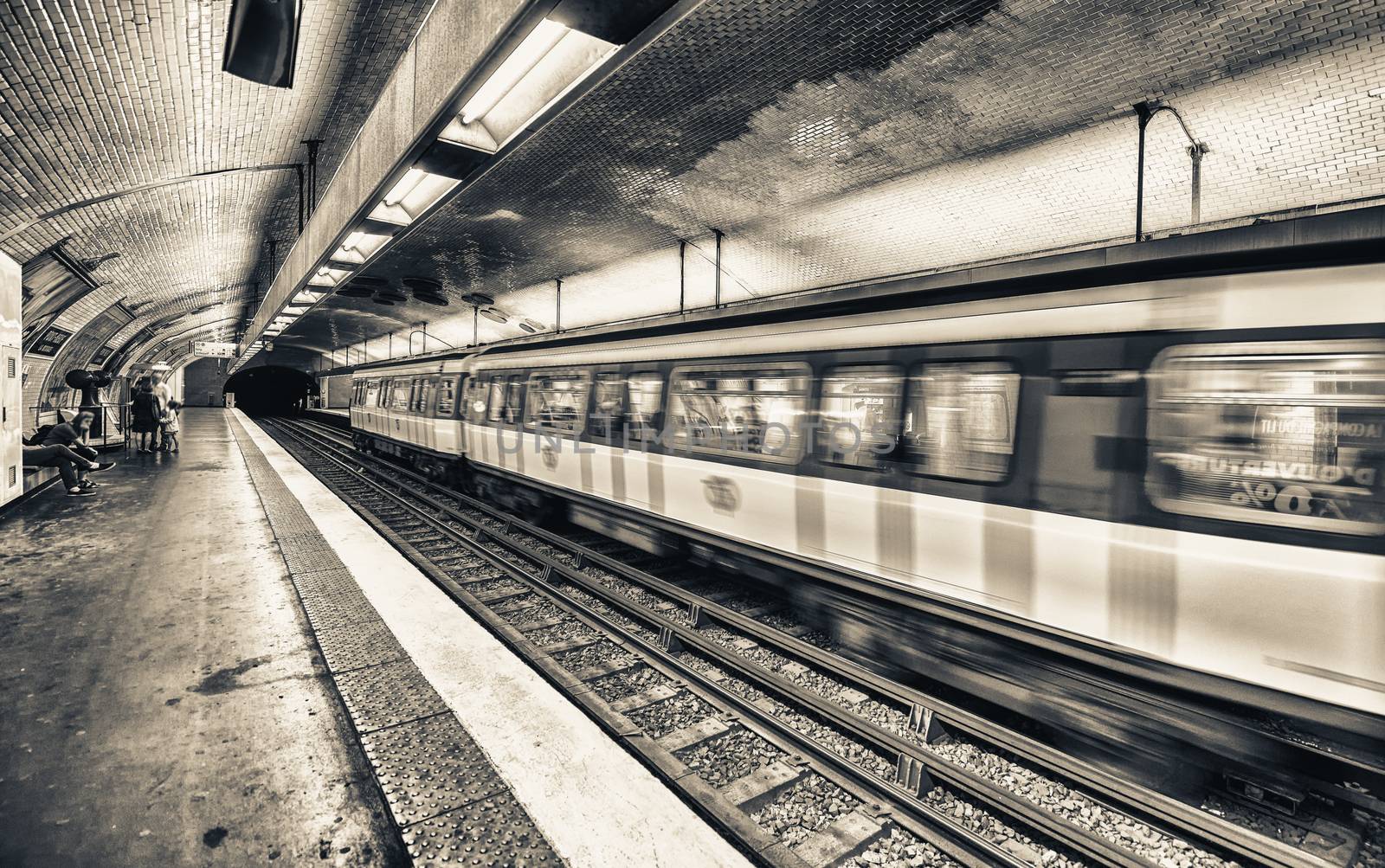 Pairs. Metro train speeding up in the subway by jovannig