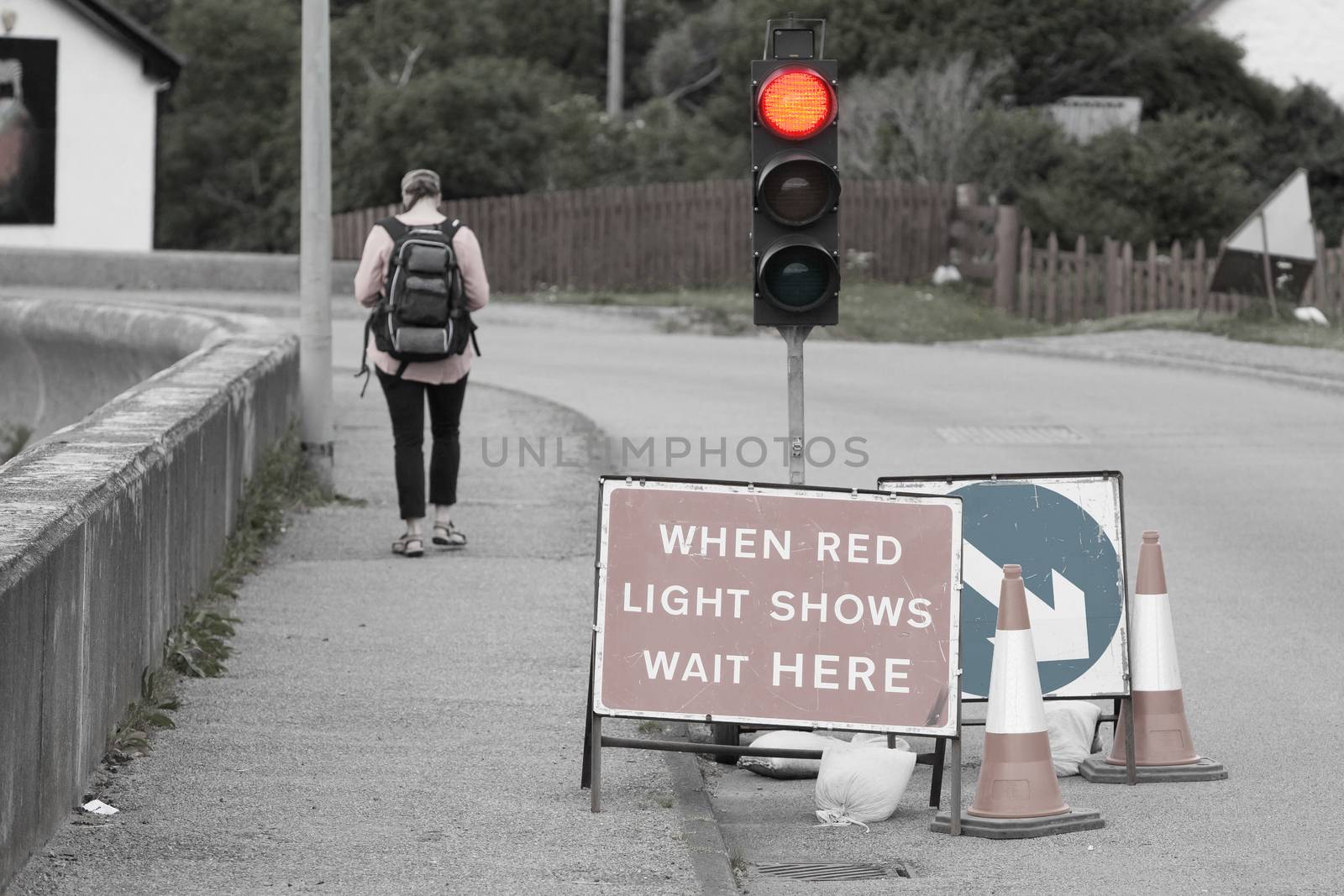 Emergency traffic light with sign at a road in Scotland