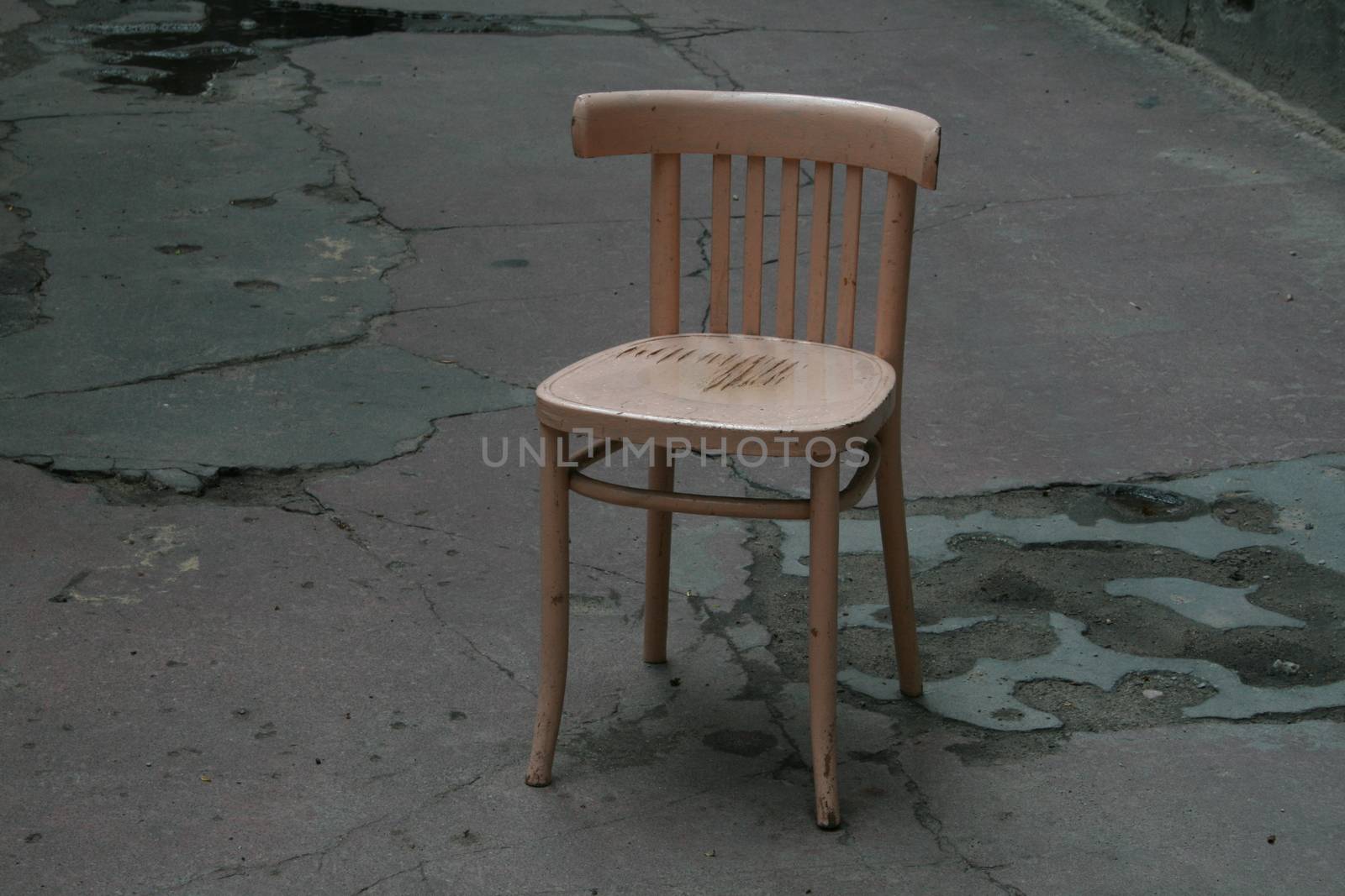Empty chair symbolizing loneliness by MichalLudwiczak