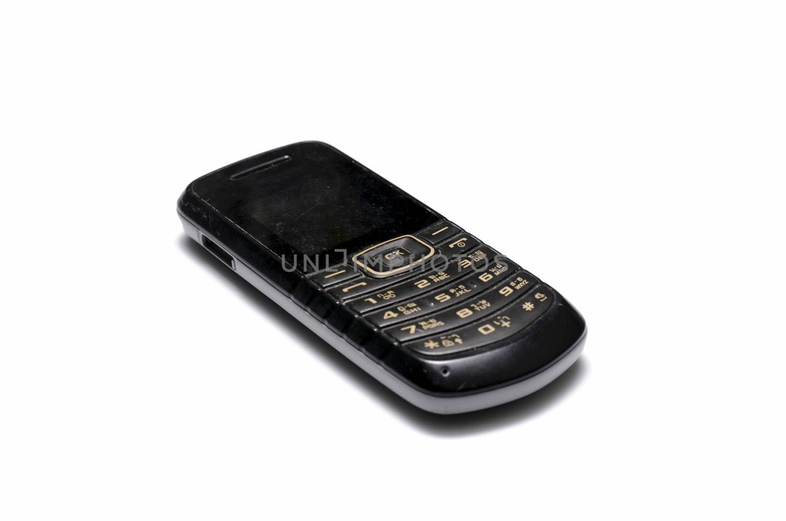 old mobile phone on a white background