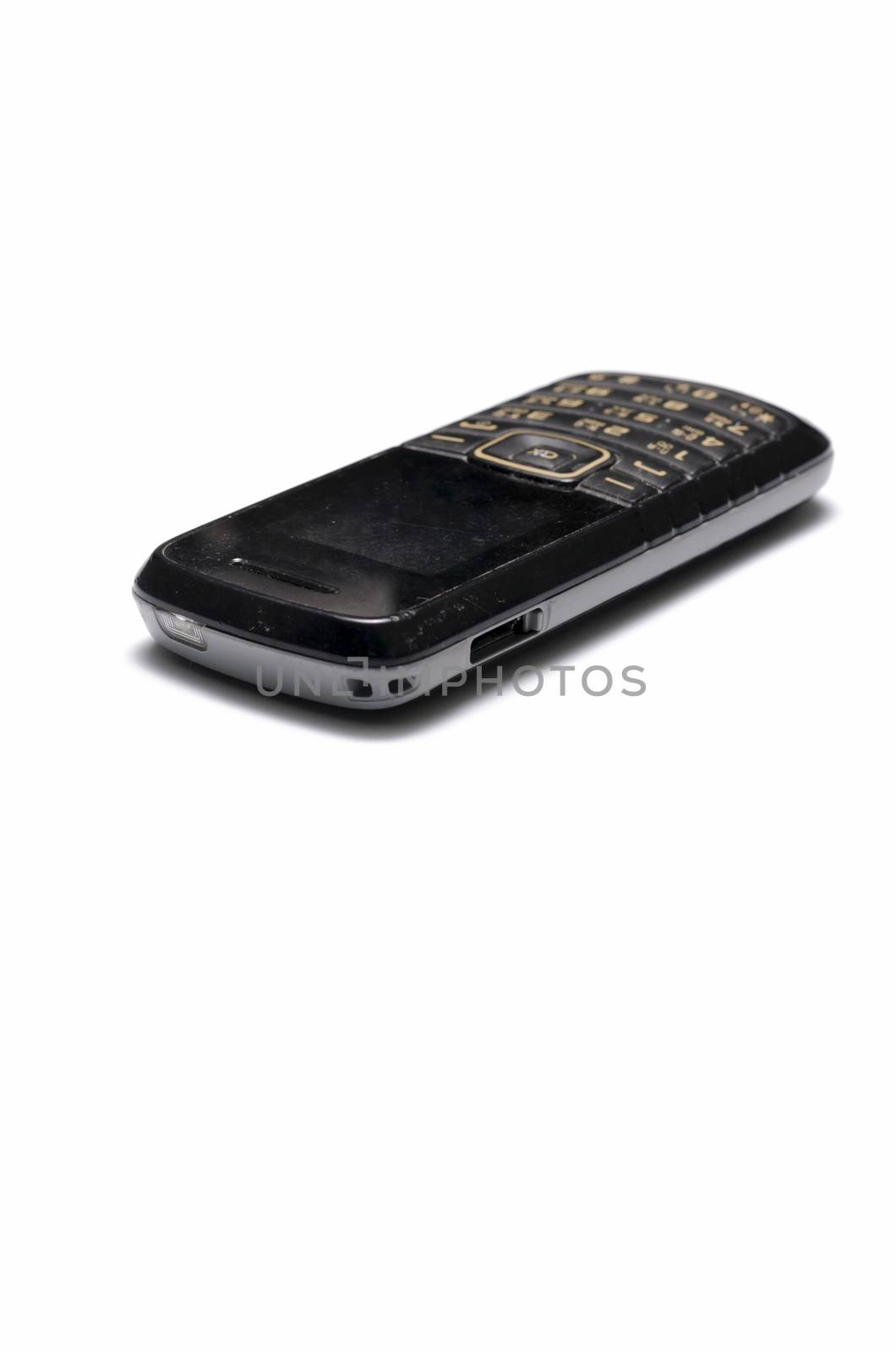 old mobile phone on a white background