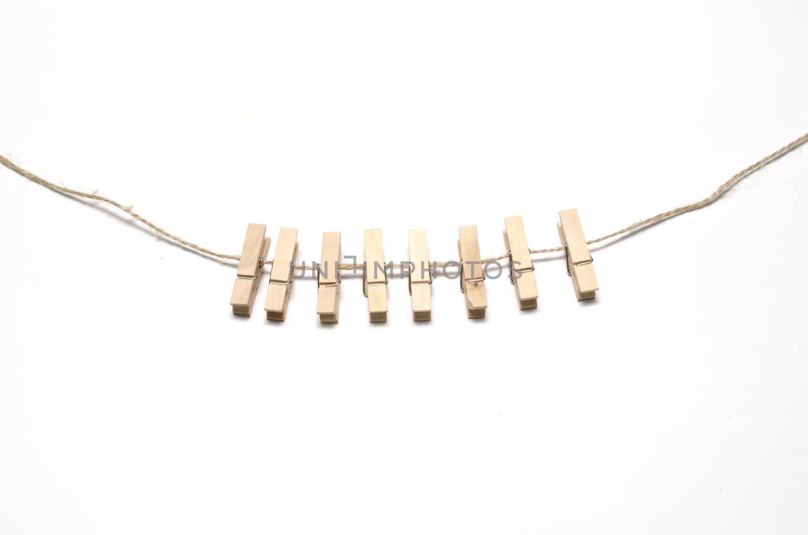 cloth pin hang with rope on a white background