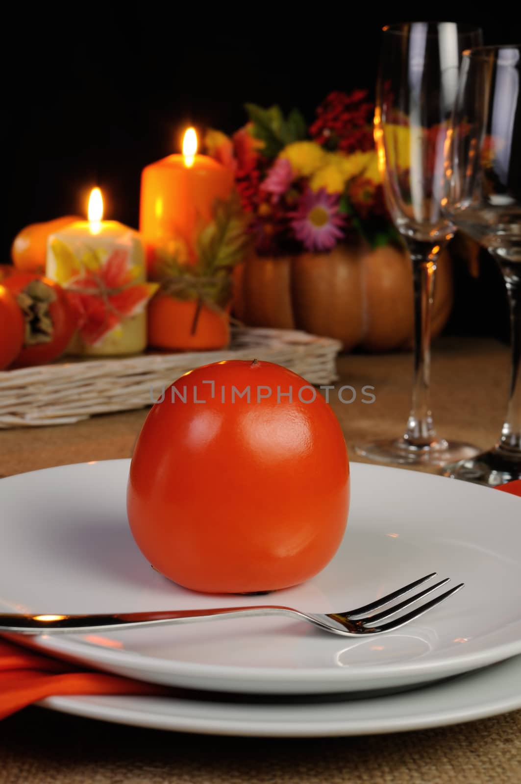 Ripe juicy persimmon on a plate